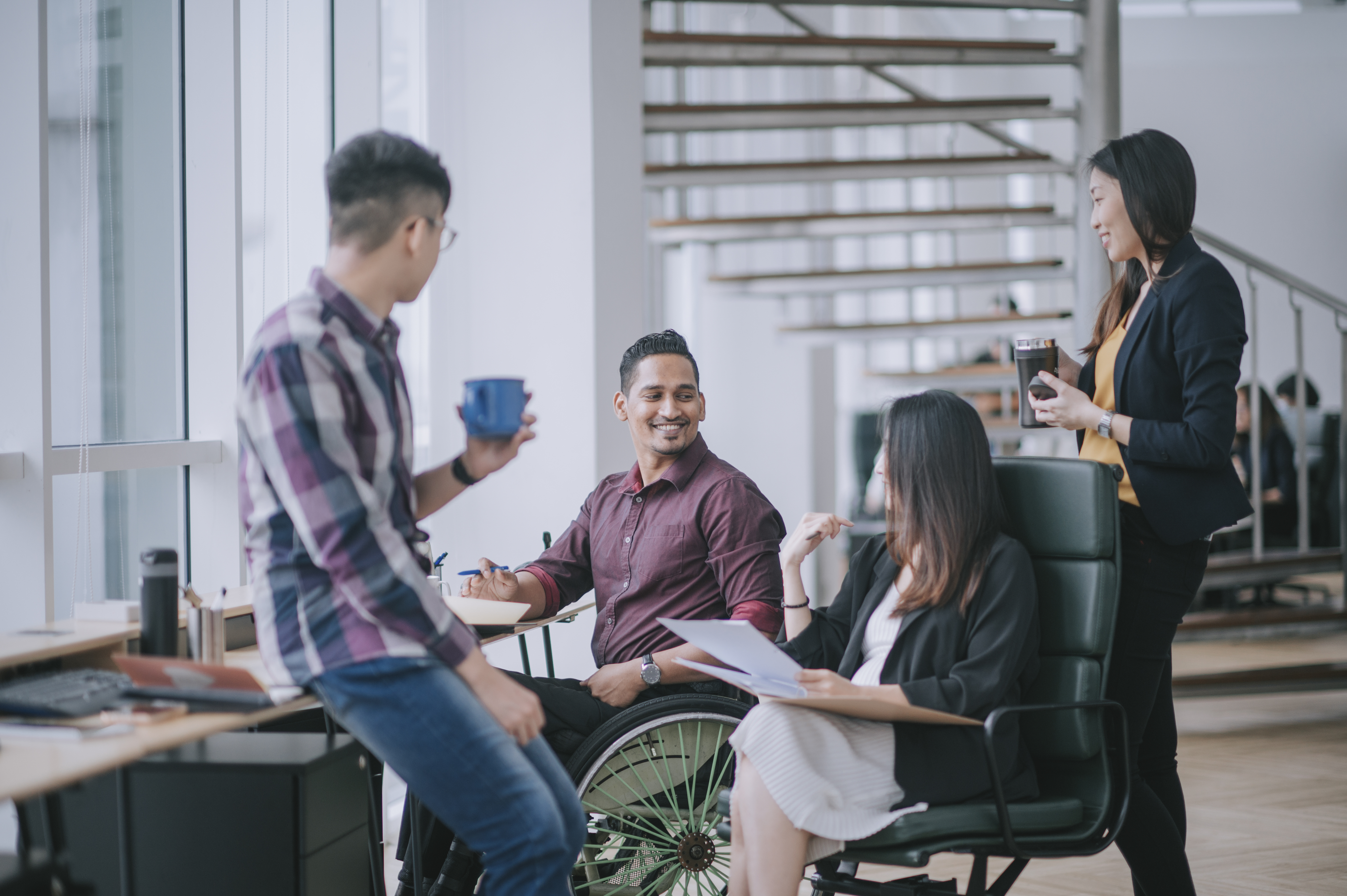 Coworkers discussing a business topic