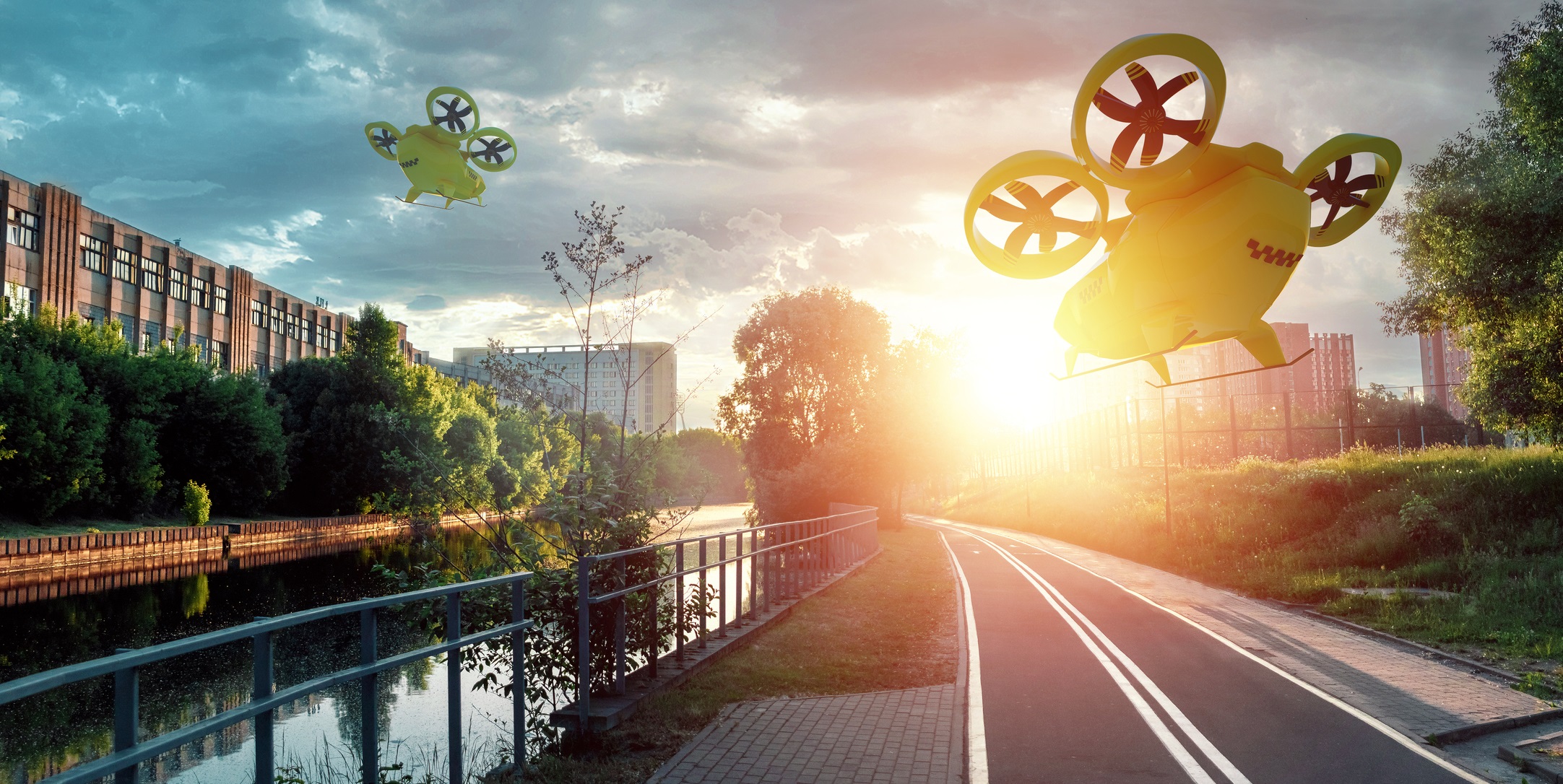 Yellow flying taxi against the sky, city electric transport drone Getty