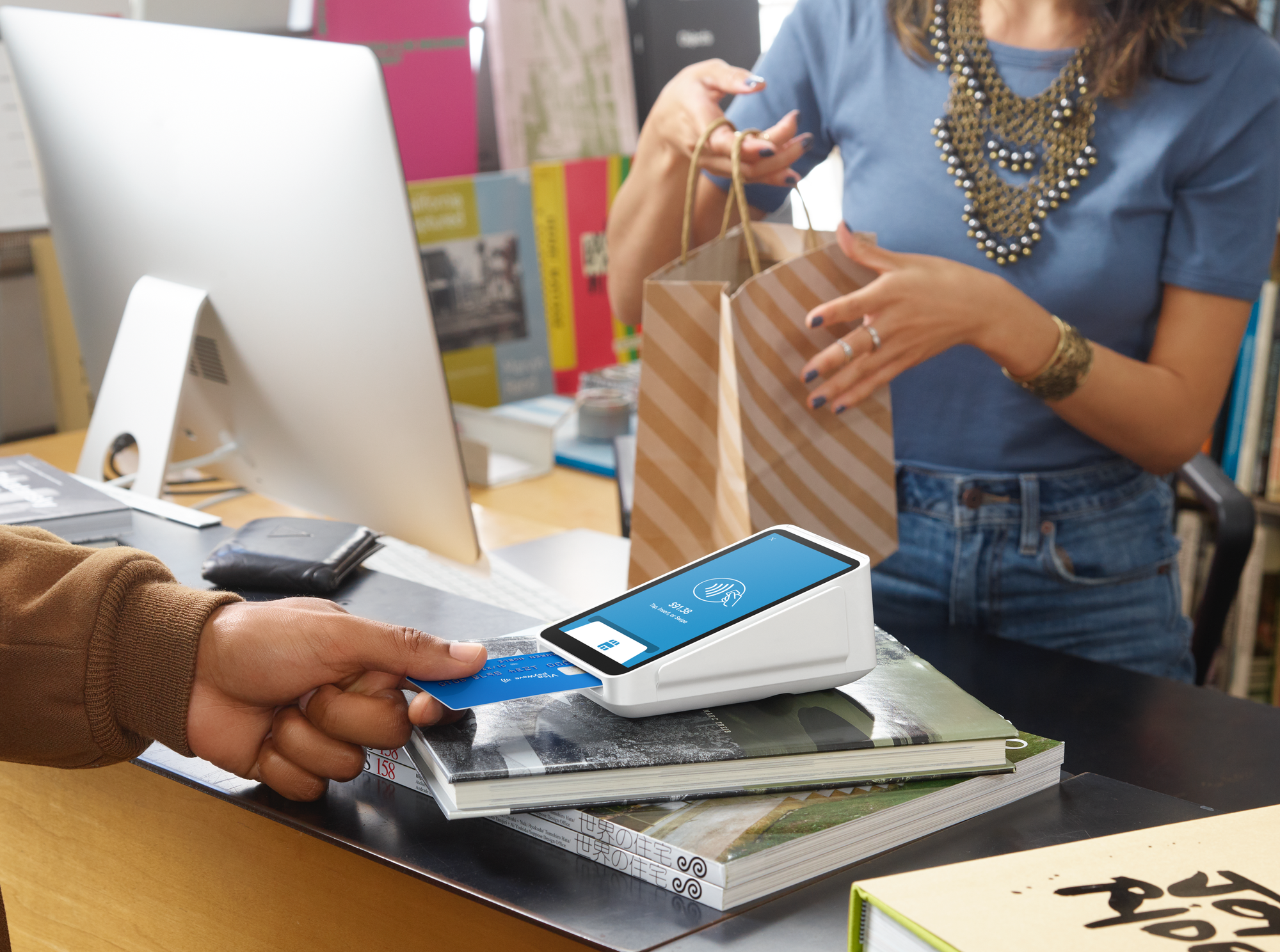 Person inserting card into reader