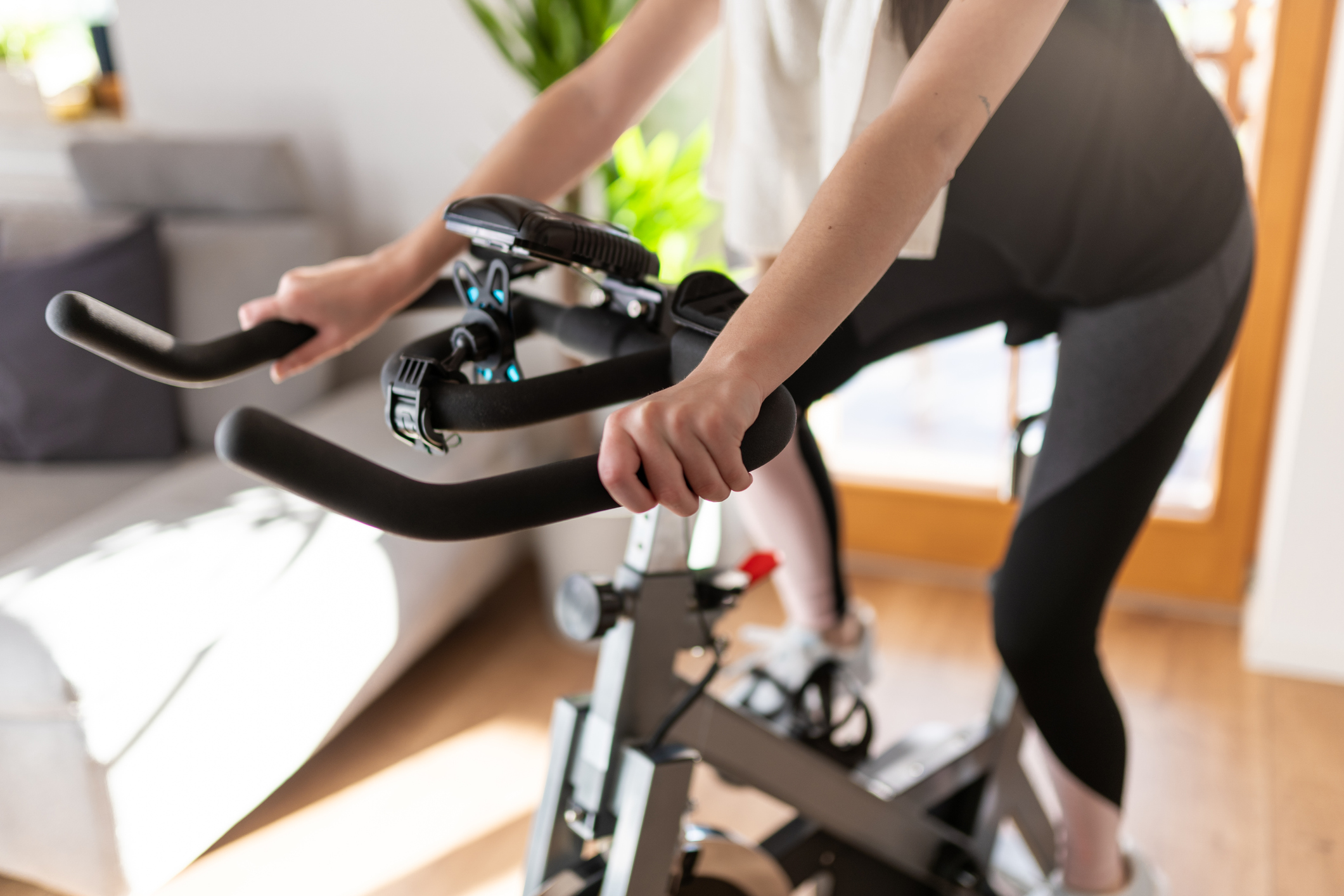 A person riding an exercise bike.