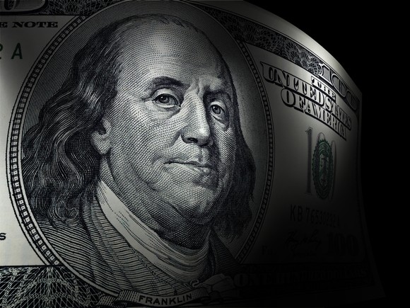 Benjamin Franklin's portrait on a hundred dollar bill.