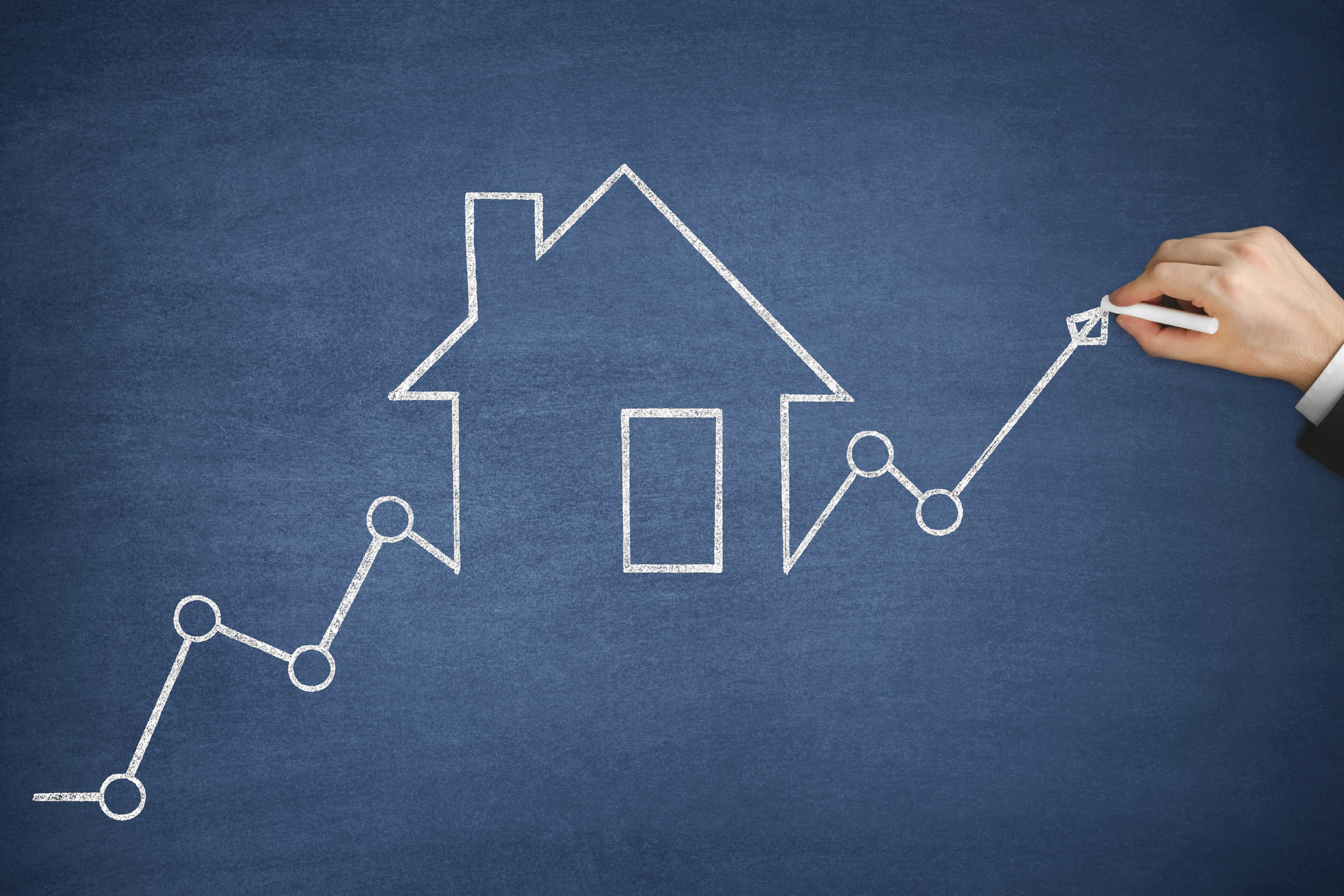 Hand on board drawing a house and then a line up.