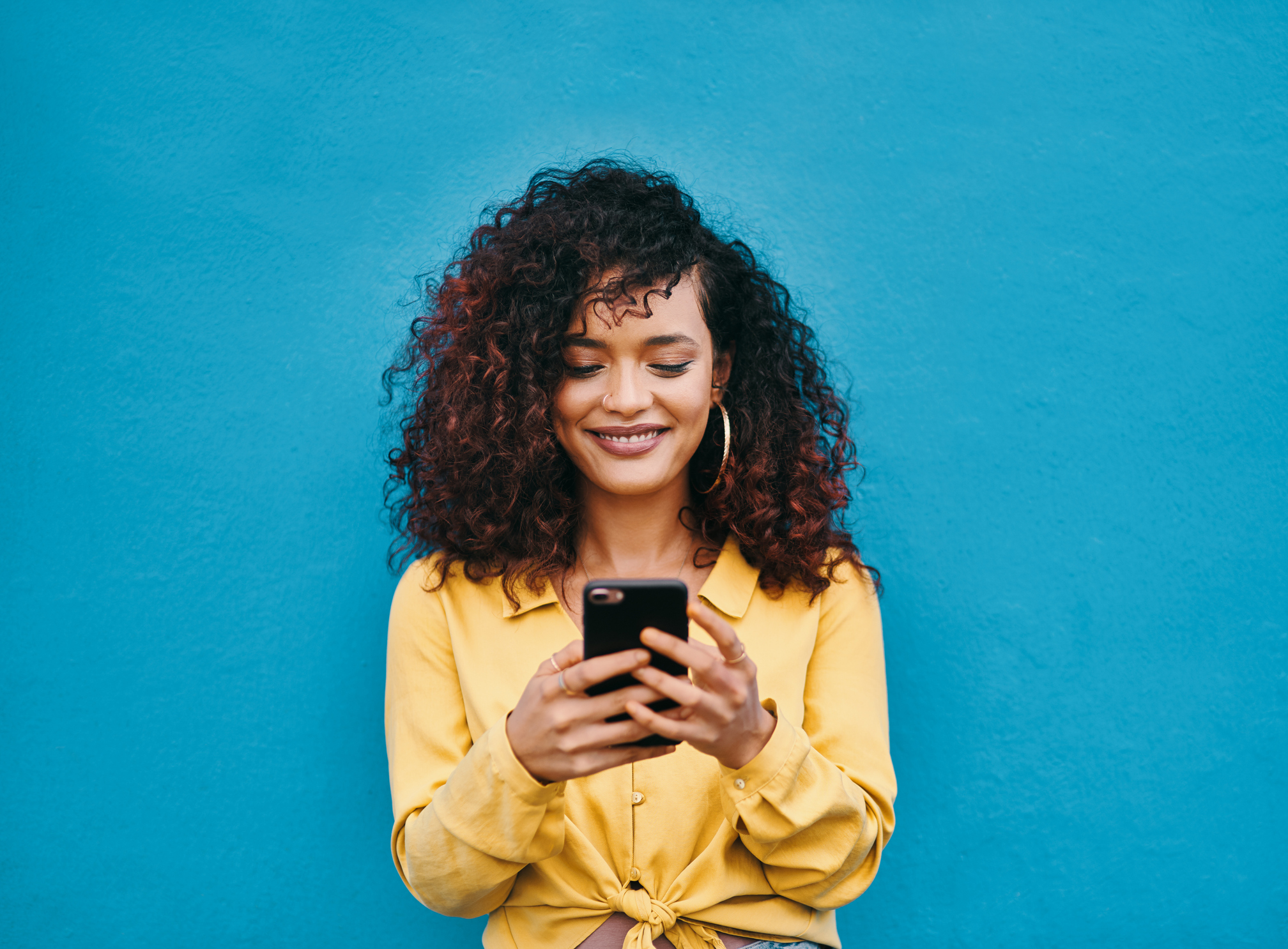 A person uses a smartphone.