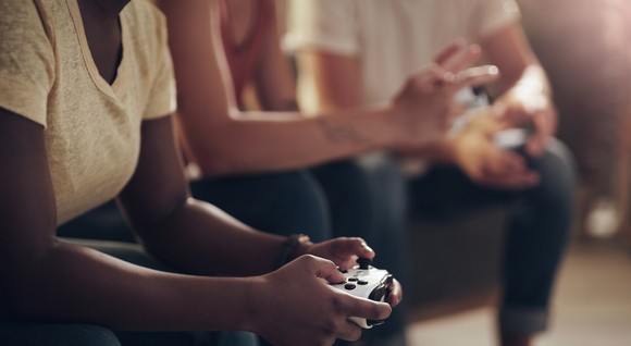 A group of friends playing video games.