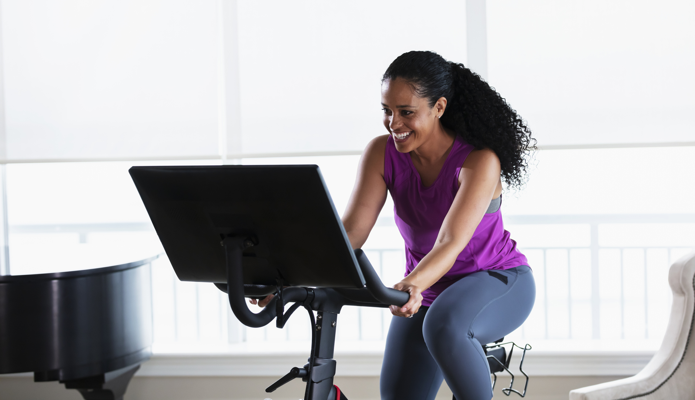 A person on an exercise bike.