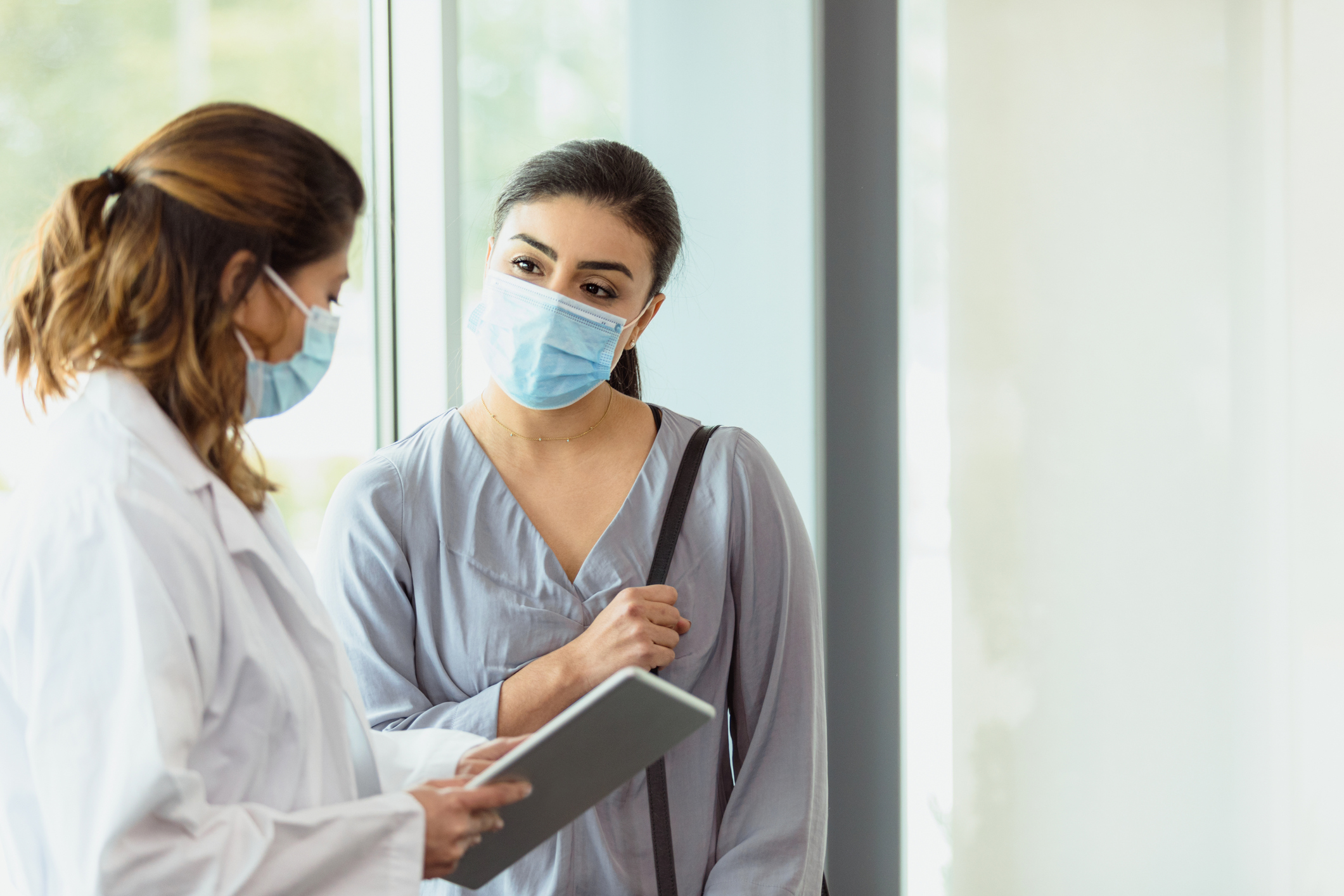 A patient and doctor at an appointment.