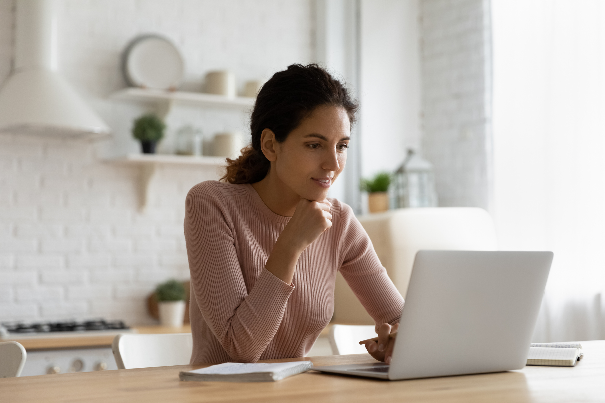 A person at a laptop.