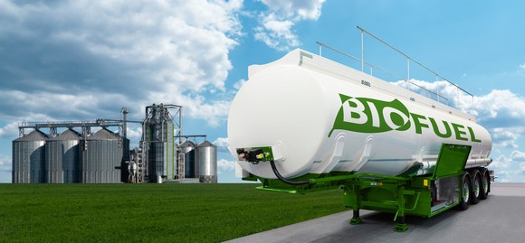 A tanker trailer is parked in front of a biodiesel facility. 