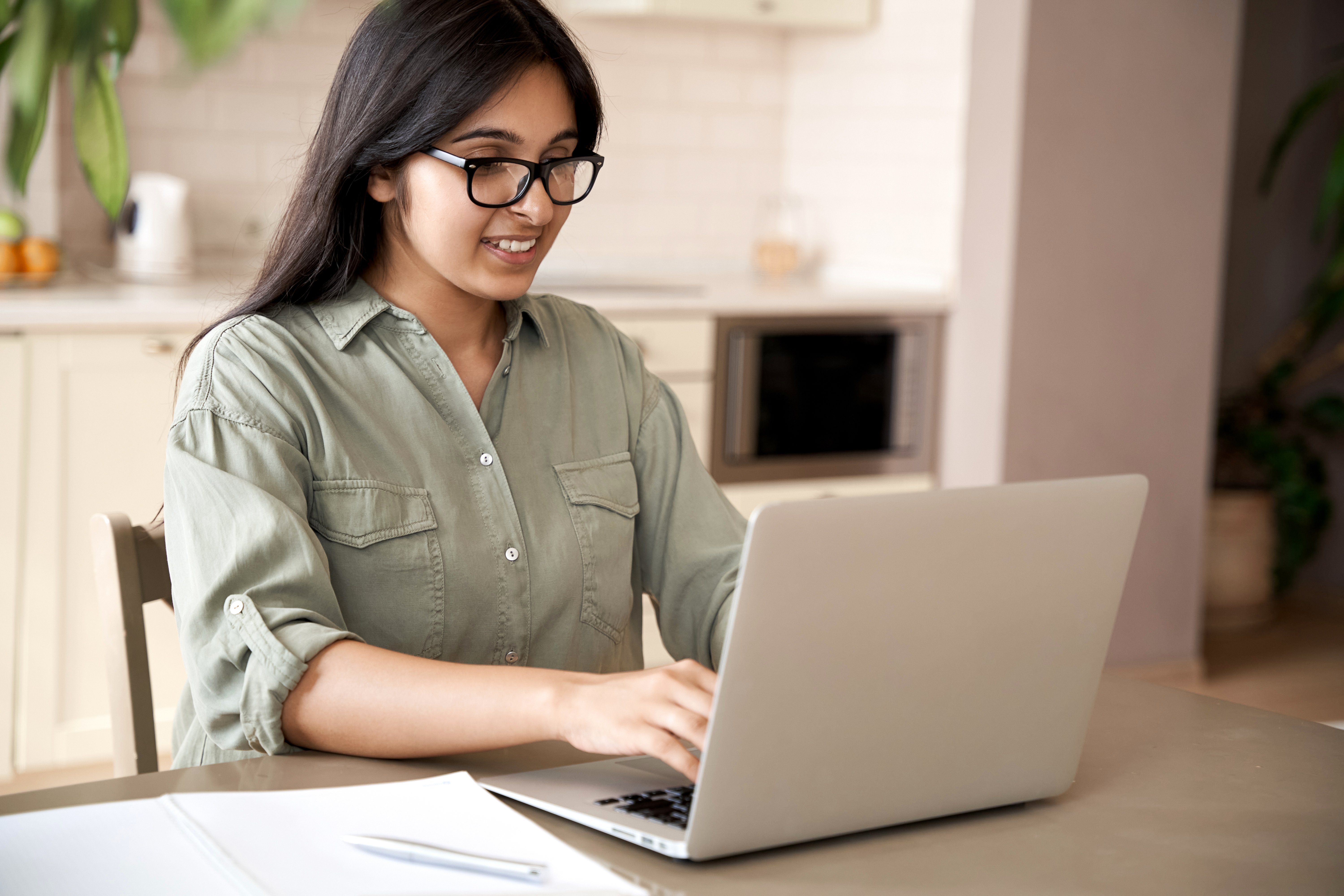A person using a laptop computer.