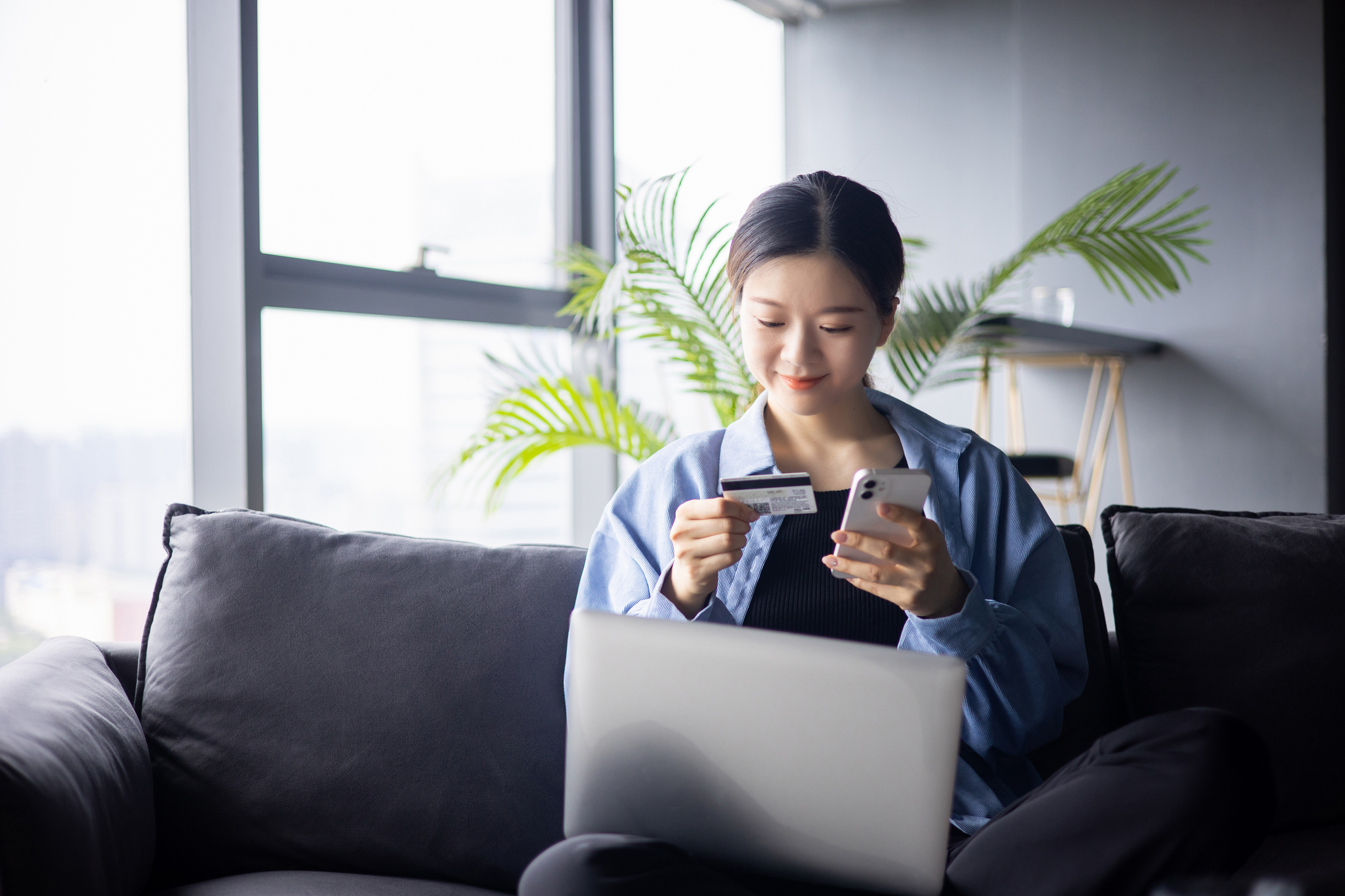A person making an online purchase.