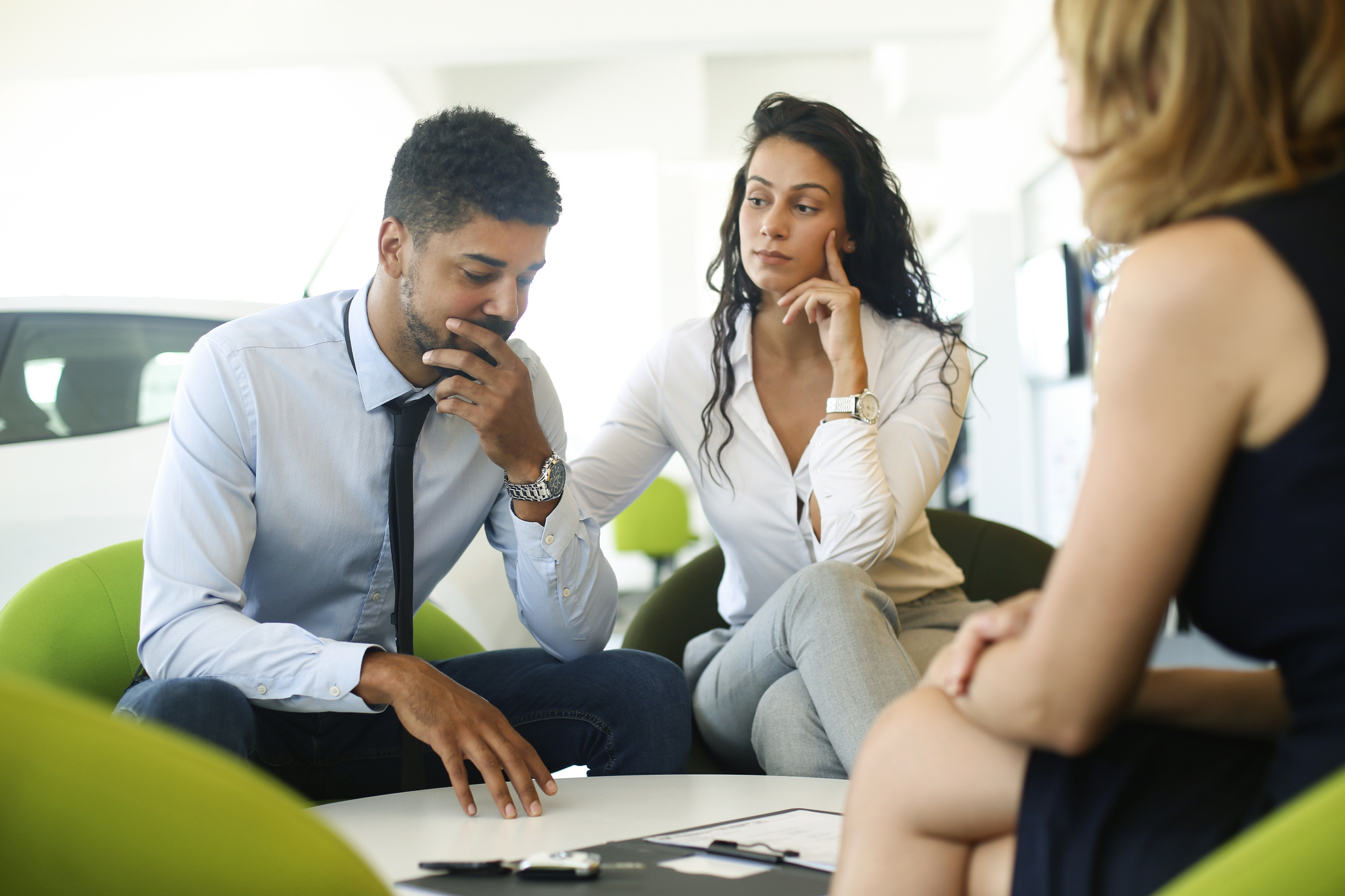 Two people considering offer.