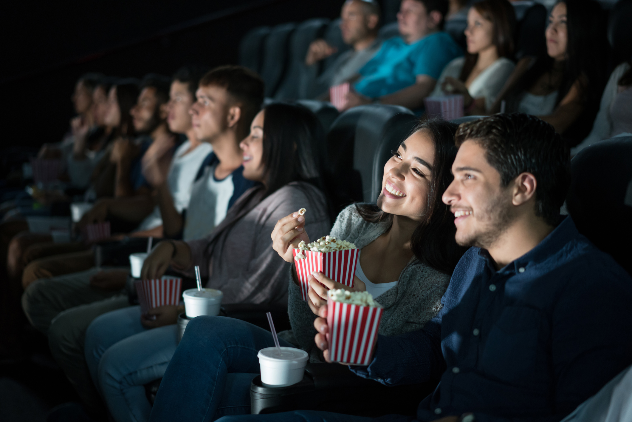 A group of people in a movie theater.