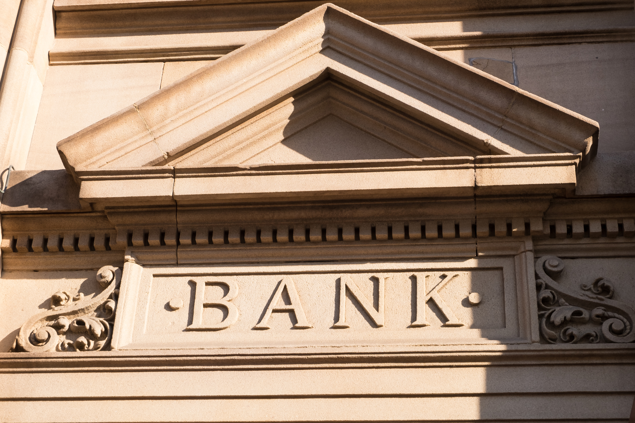 Sturdy masonry building reads BANK.