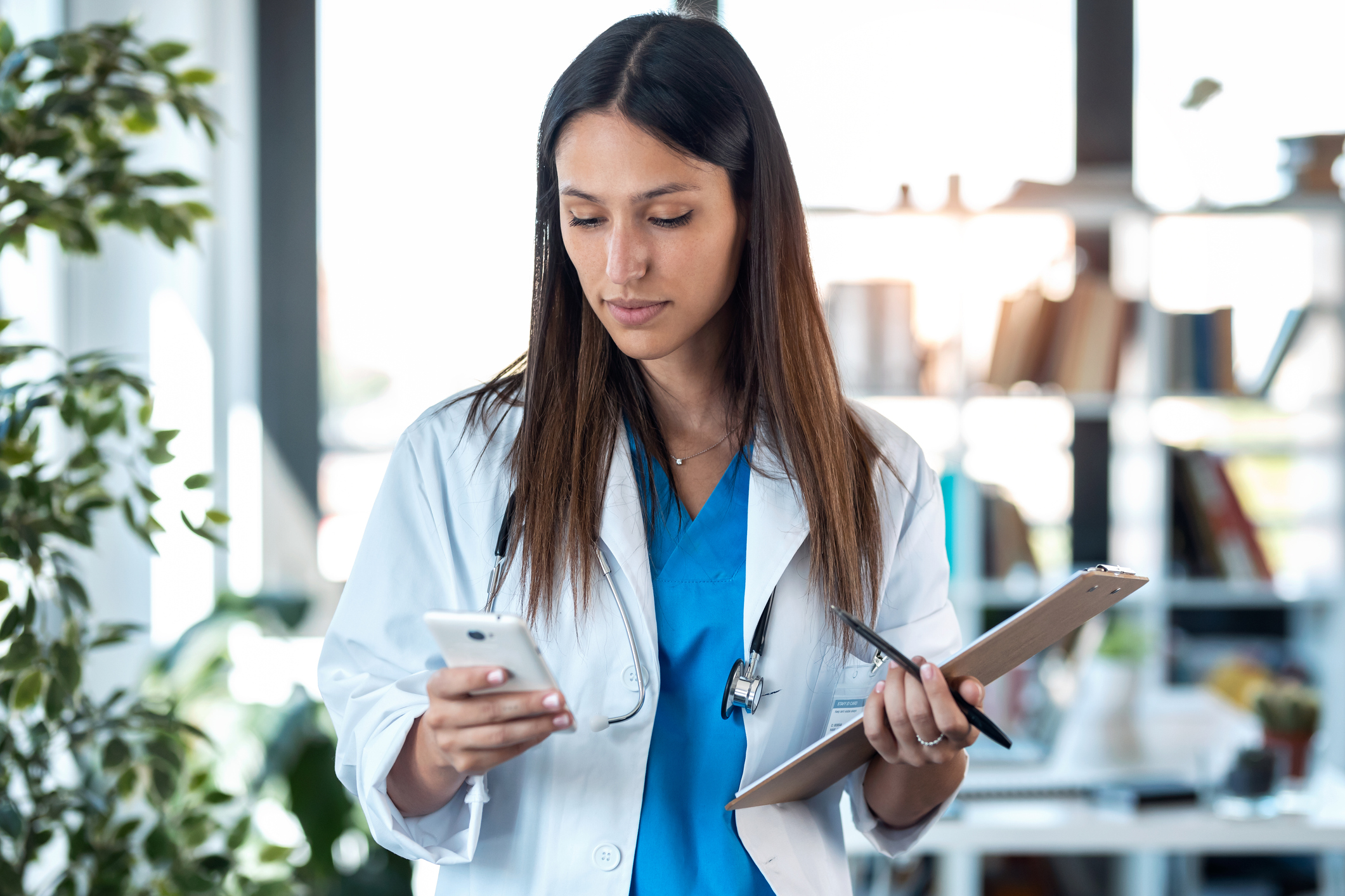 Doctor using a cellphone.