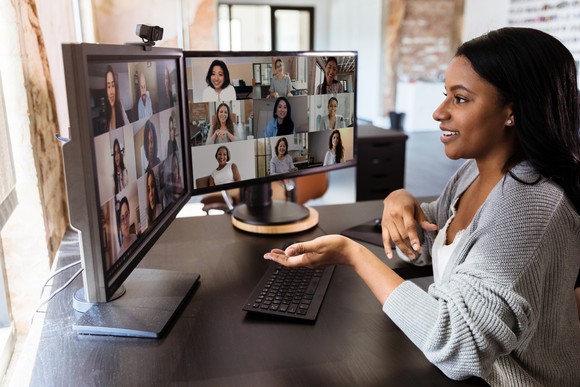 A person communicating during a video conference.
