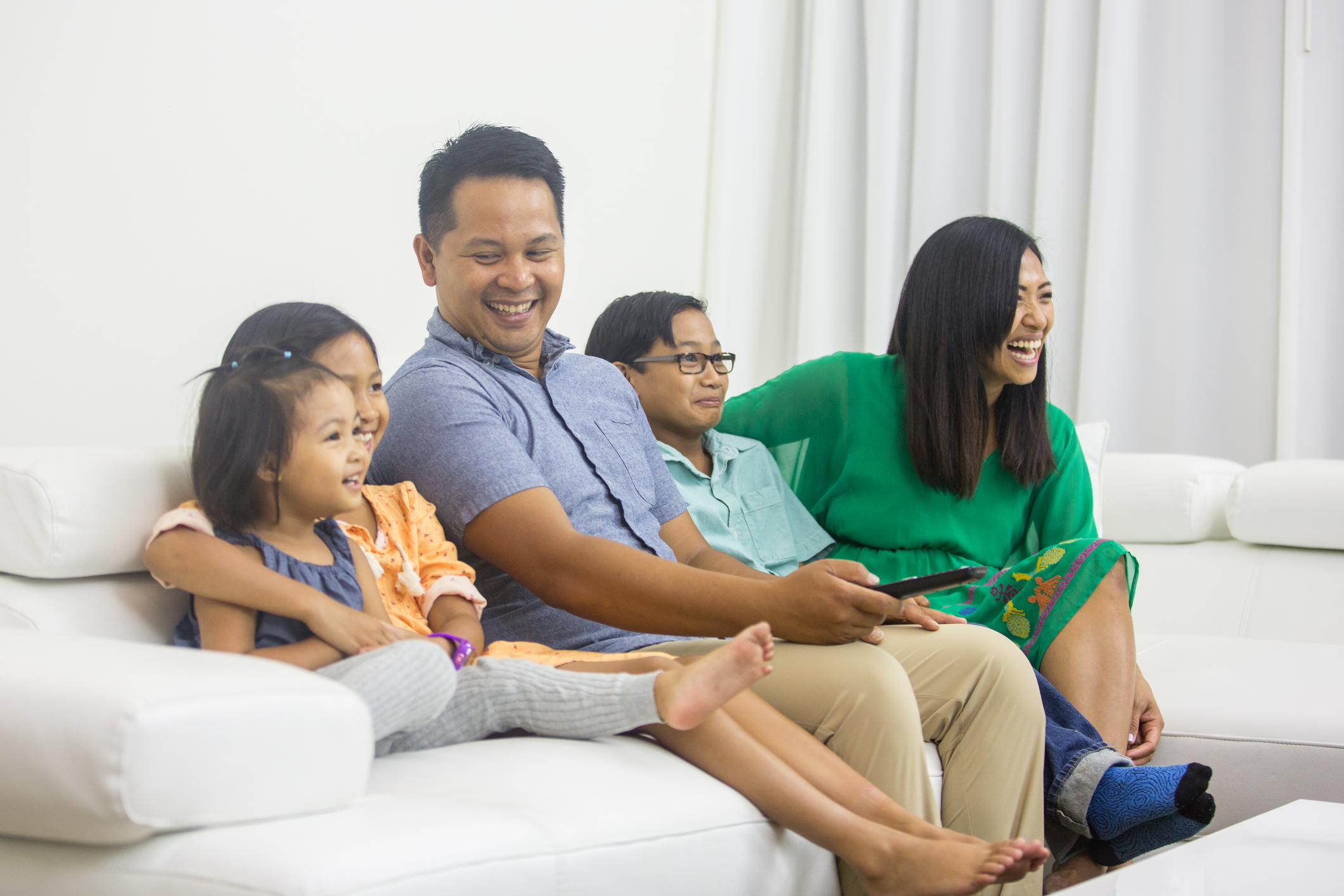 A family watching television.