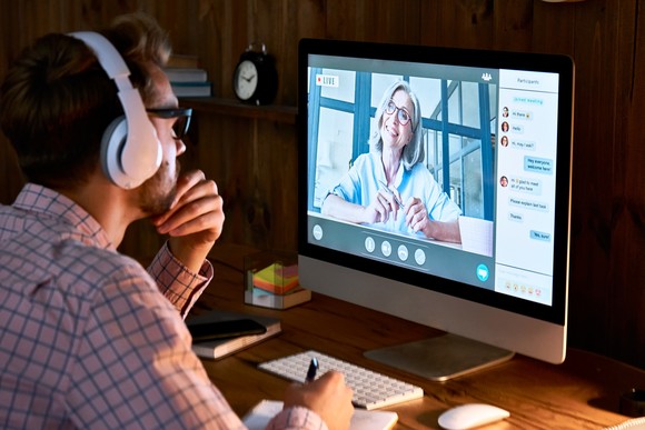 A person on a video call on a computer.
