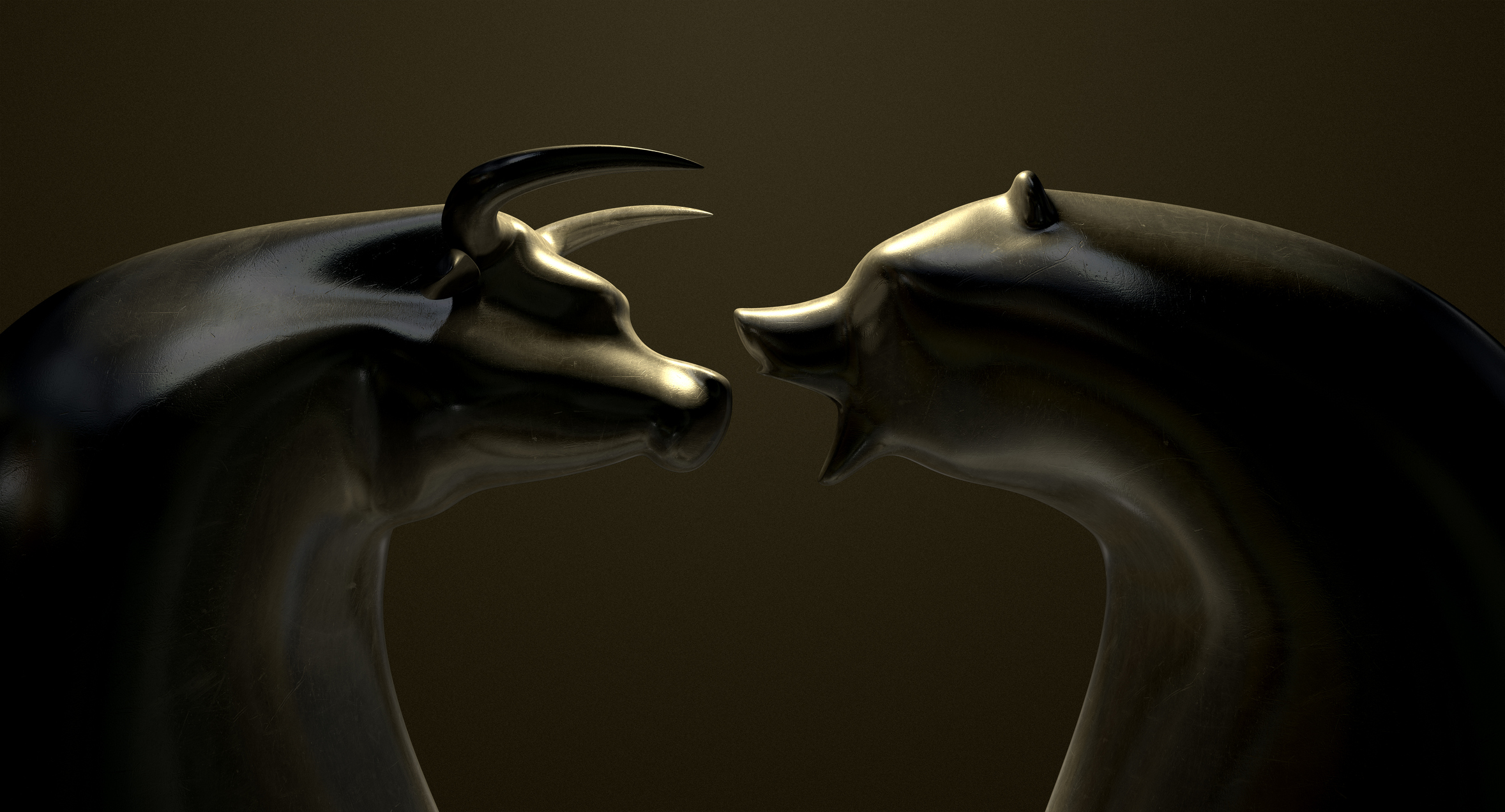 Bronze bull and bear with black background.