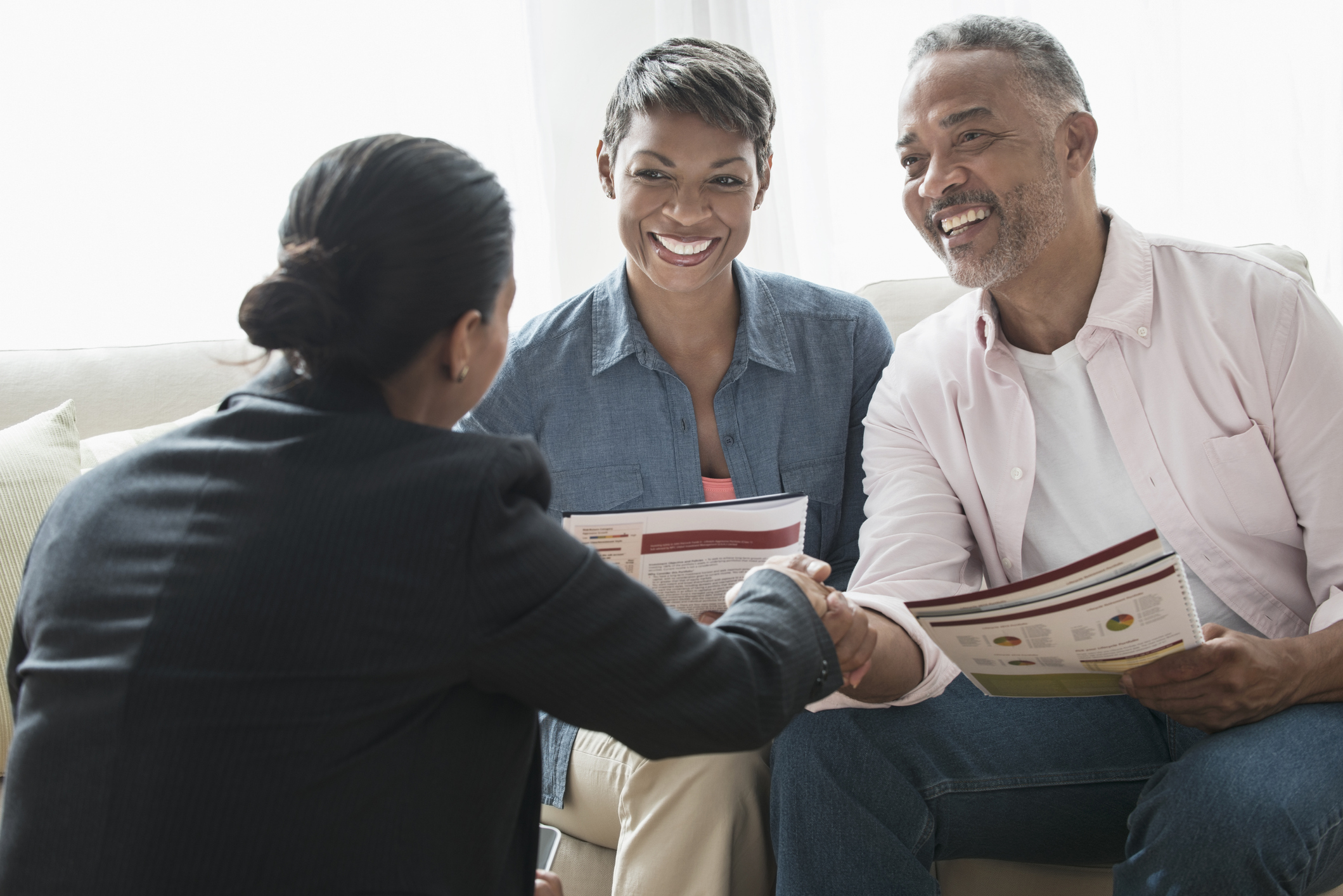 A couple meeting with an advisor.