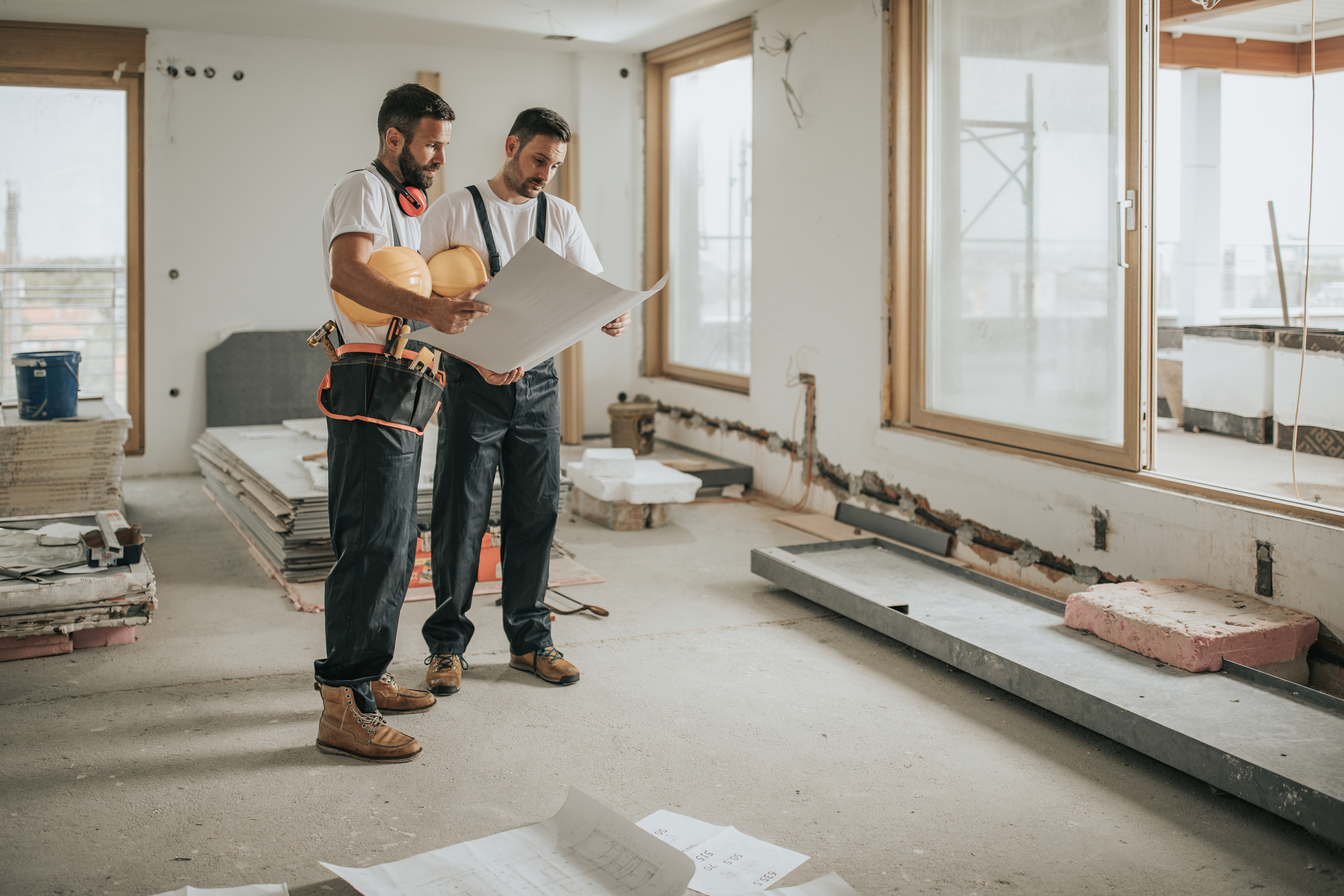 Workers discussing a construction project.