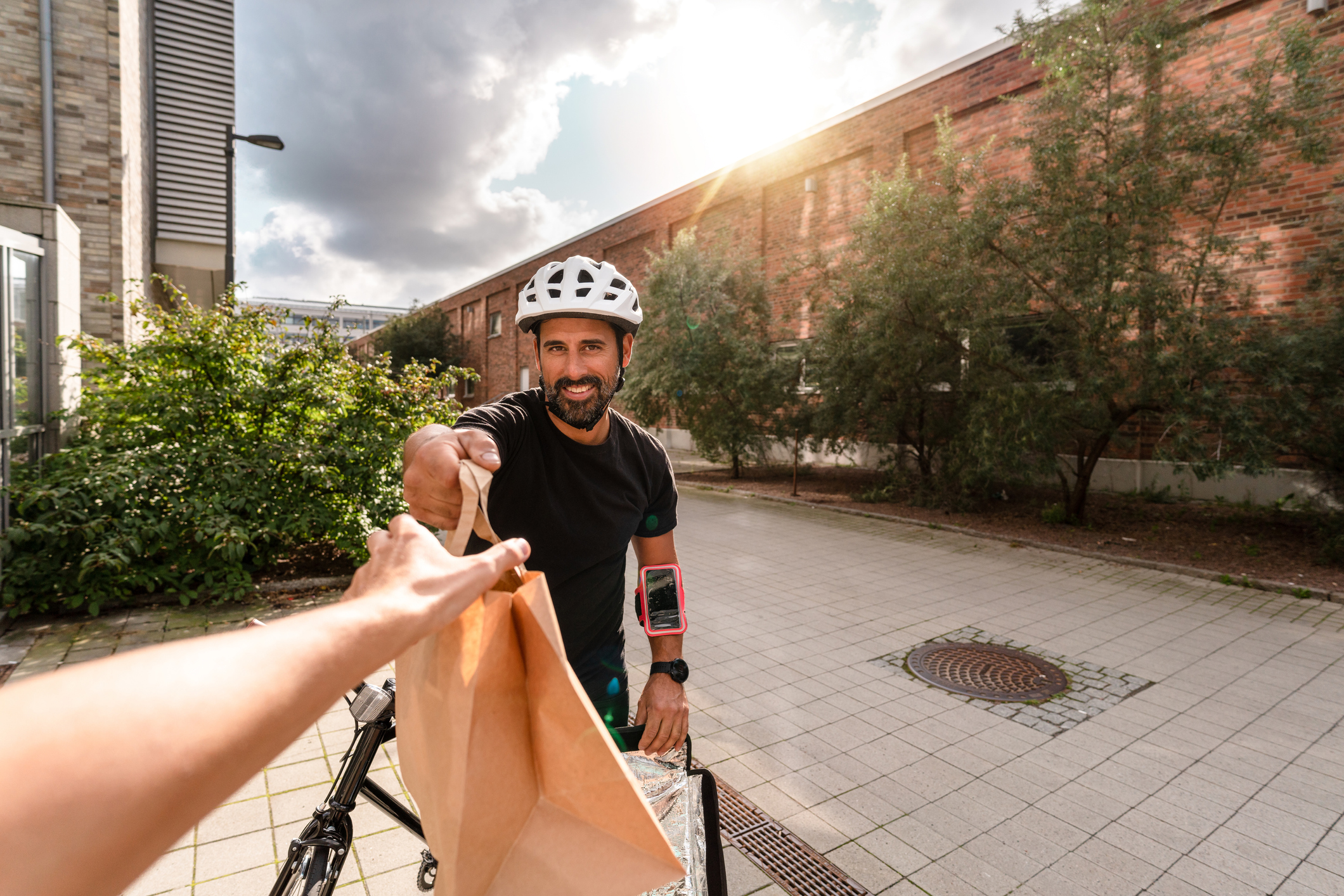 Person on a bike delivering food.