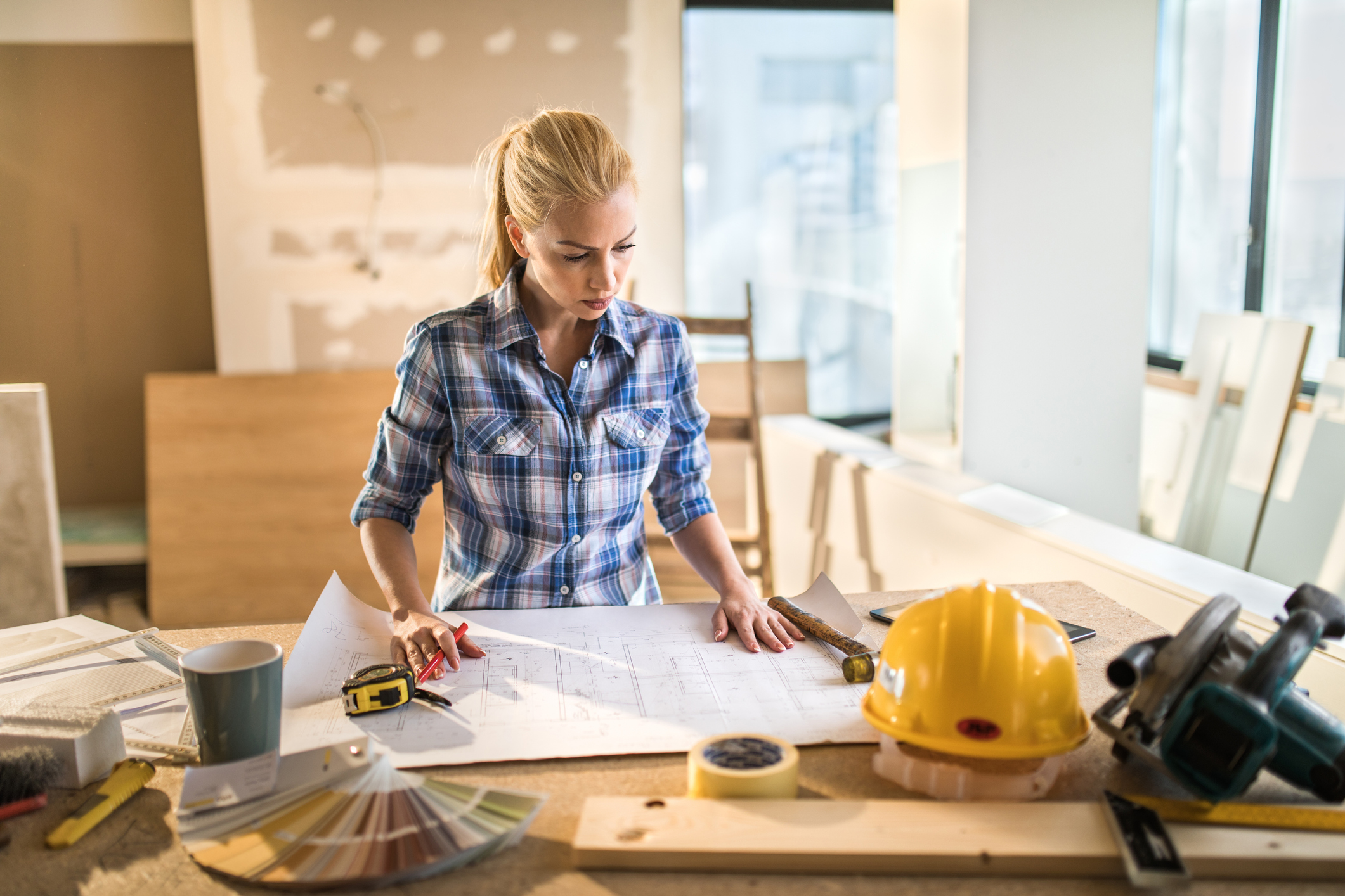 A DIY worker planning a project. 