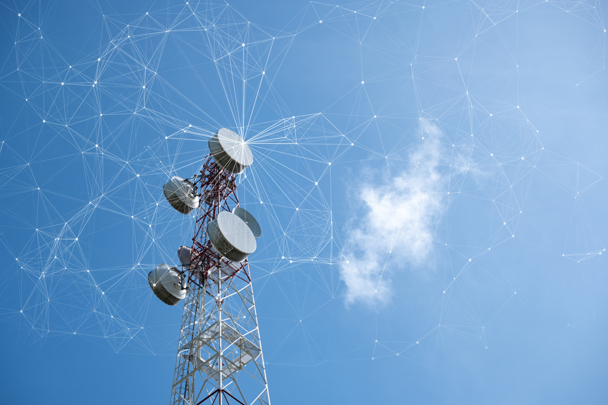 Cell tower against a bright blue sky with white lines representing a computerized cell network.