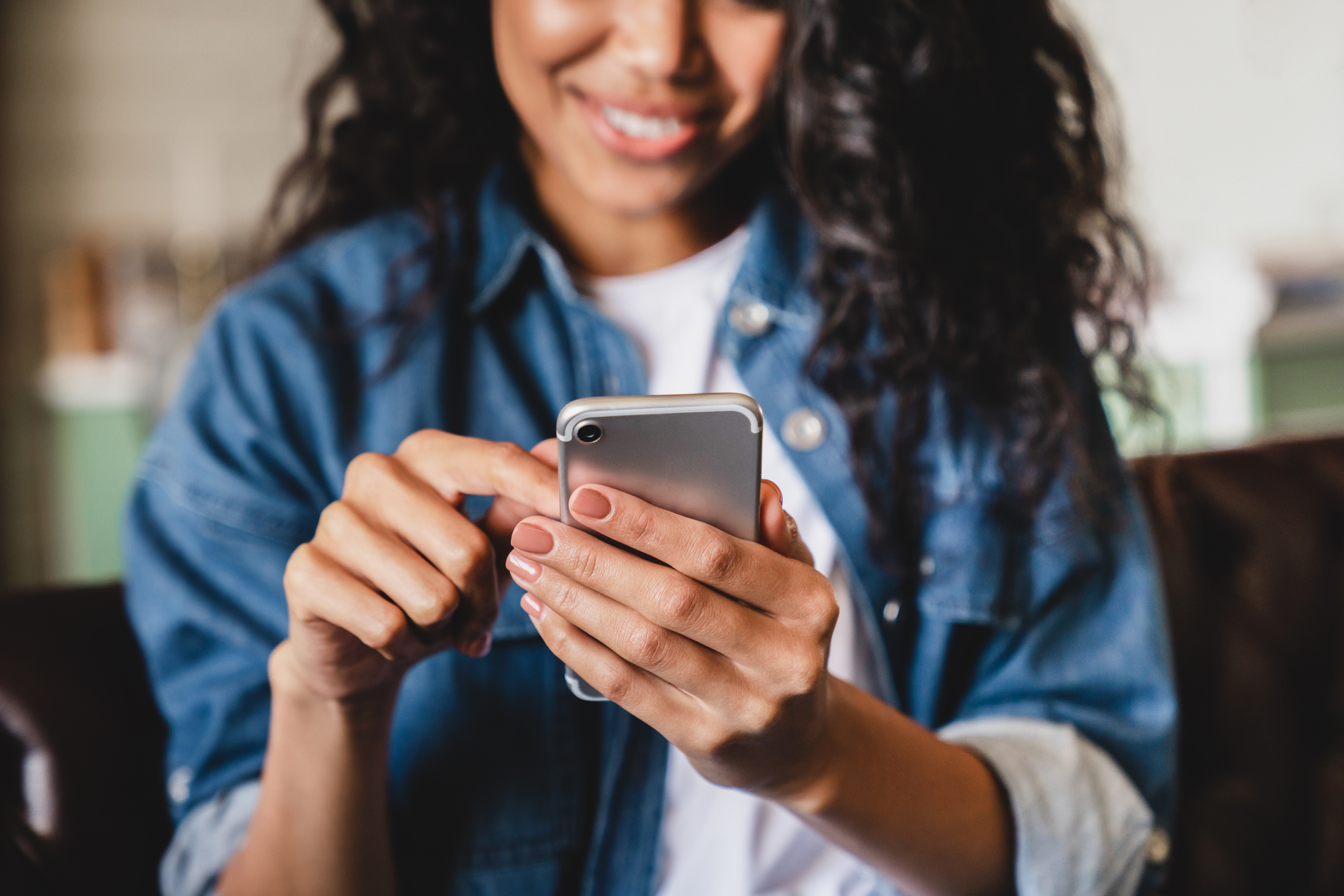 Woman on phone scrolling