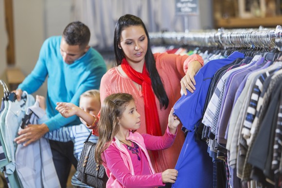 A family shopping in a store.