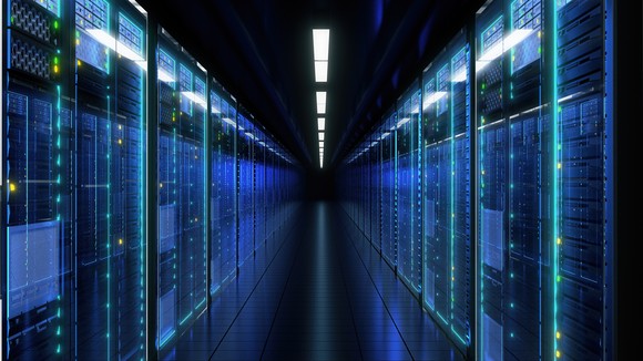 Computer servers are operating inside a data center. 