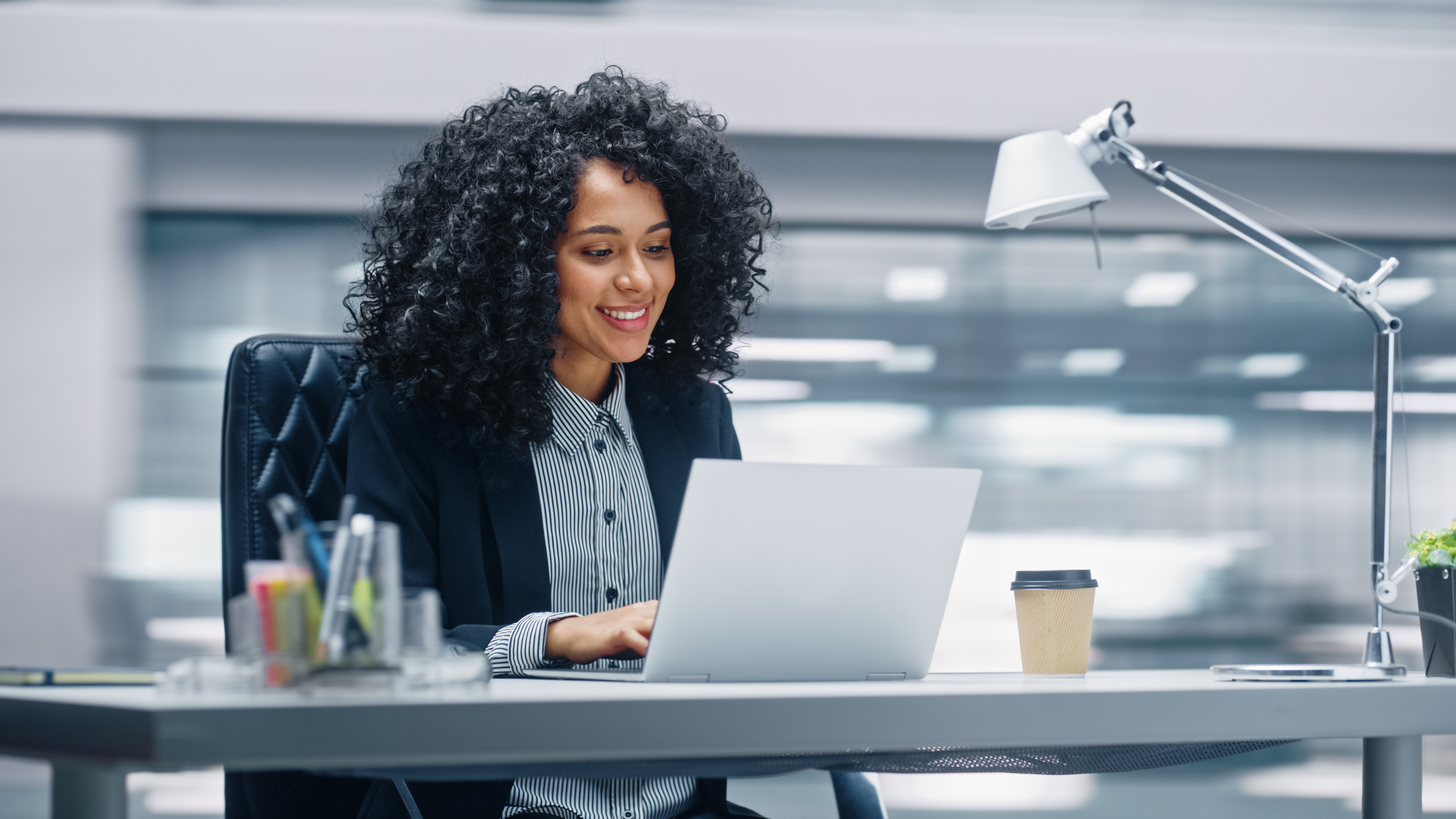 A person on a laptop.
