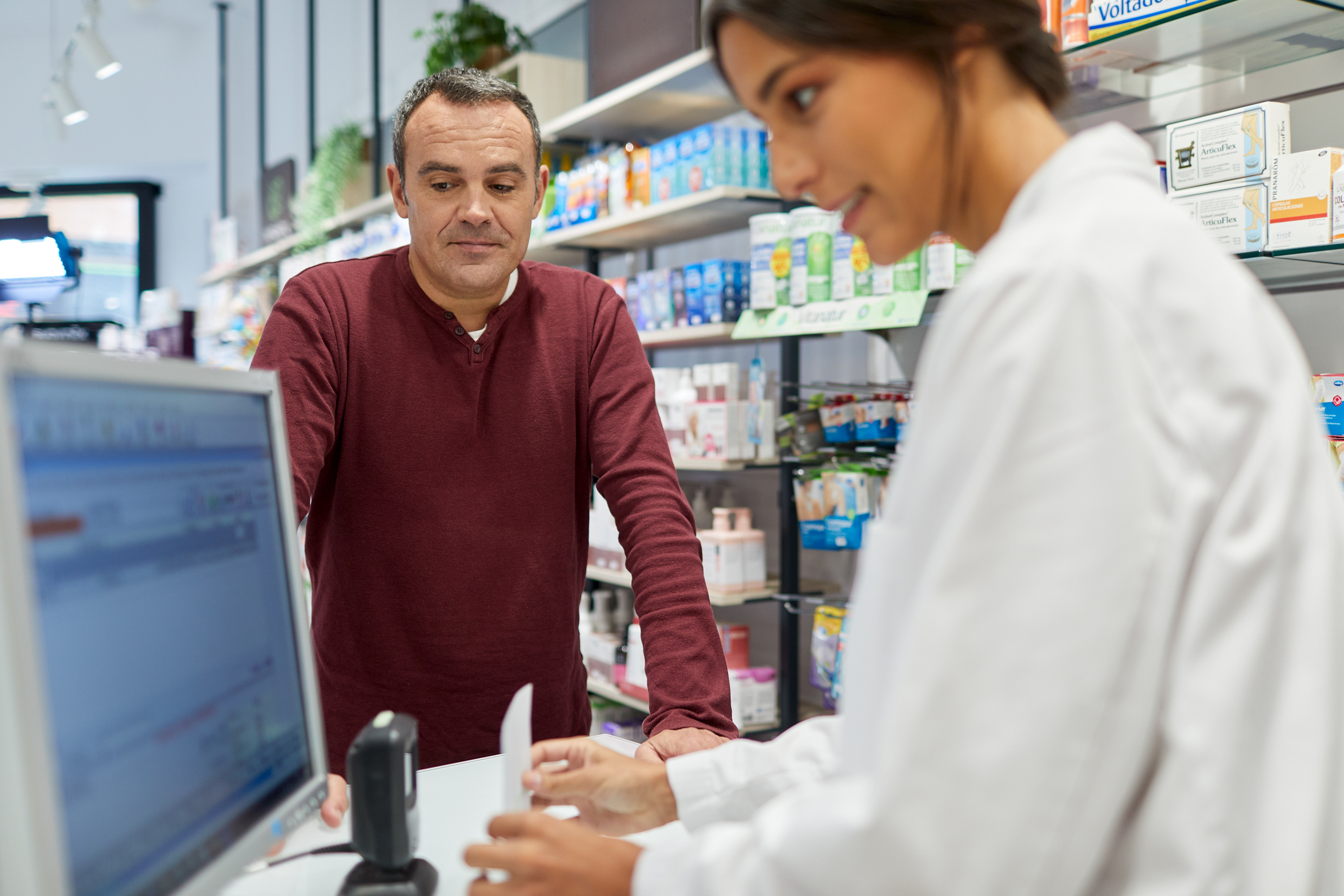 pharmacist-woman-counter