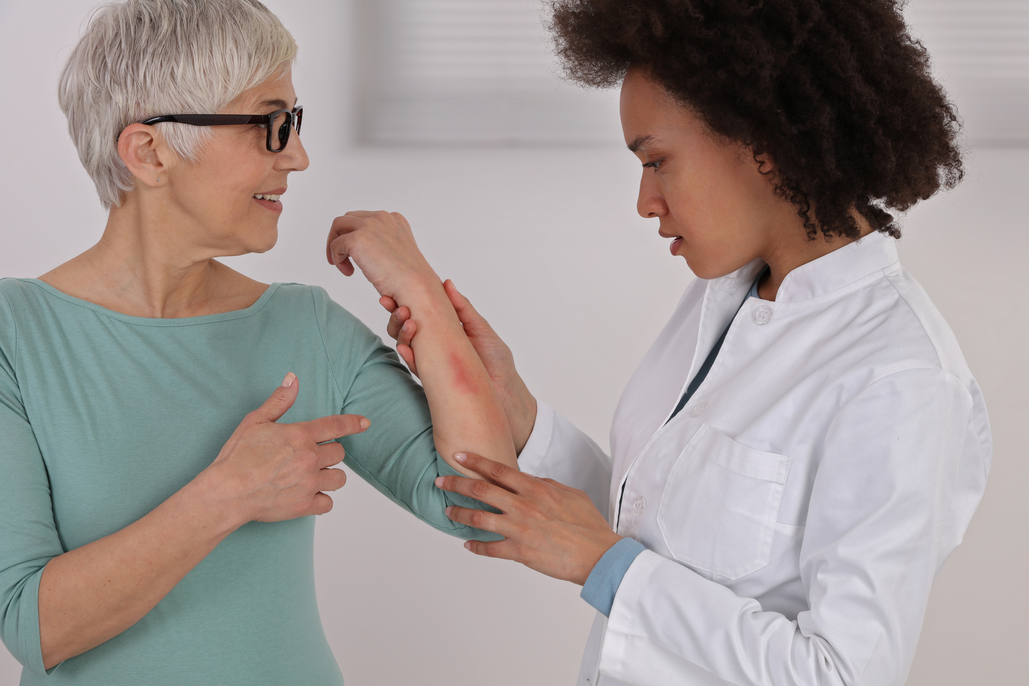 Doctor in consultation with a patient.