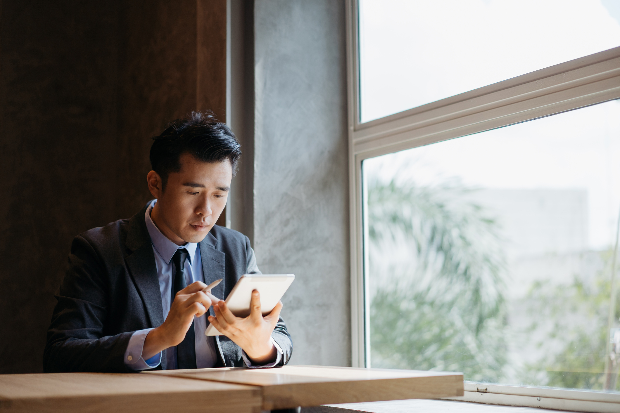 Investor studying tablet3