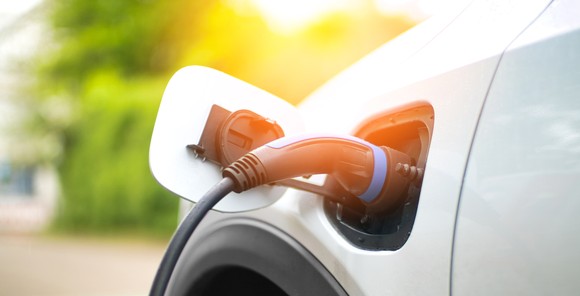An electric vehicle being charged.