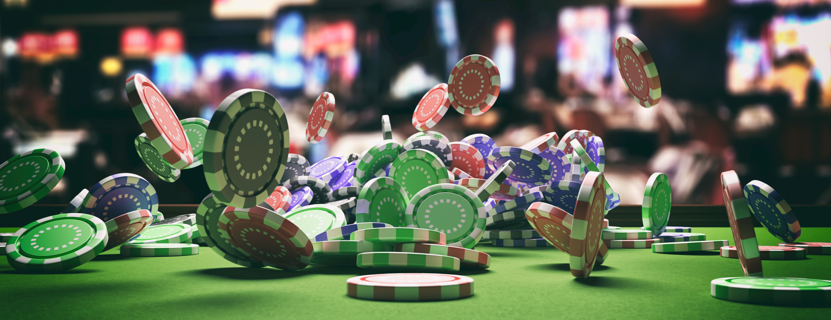 Casino table with chips falling on it