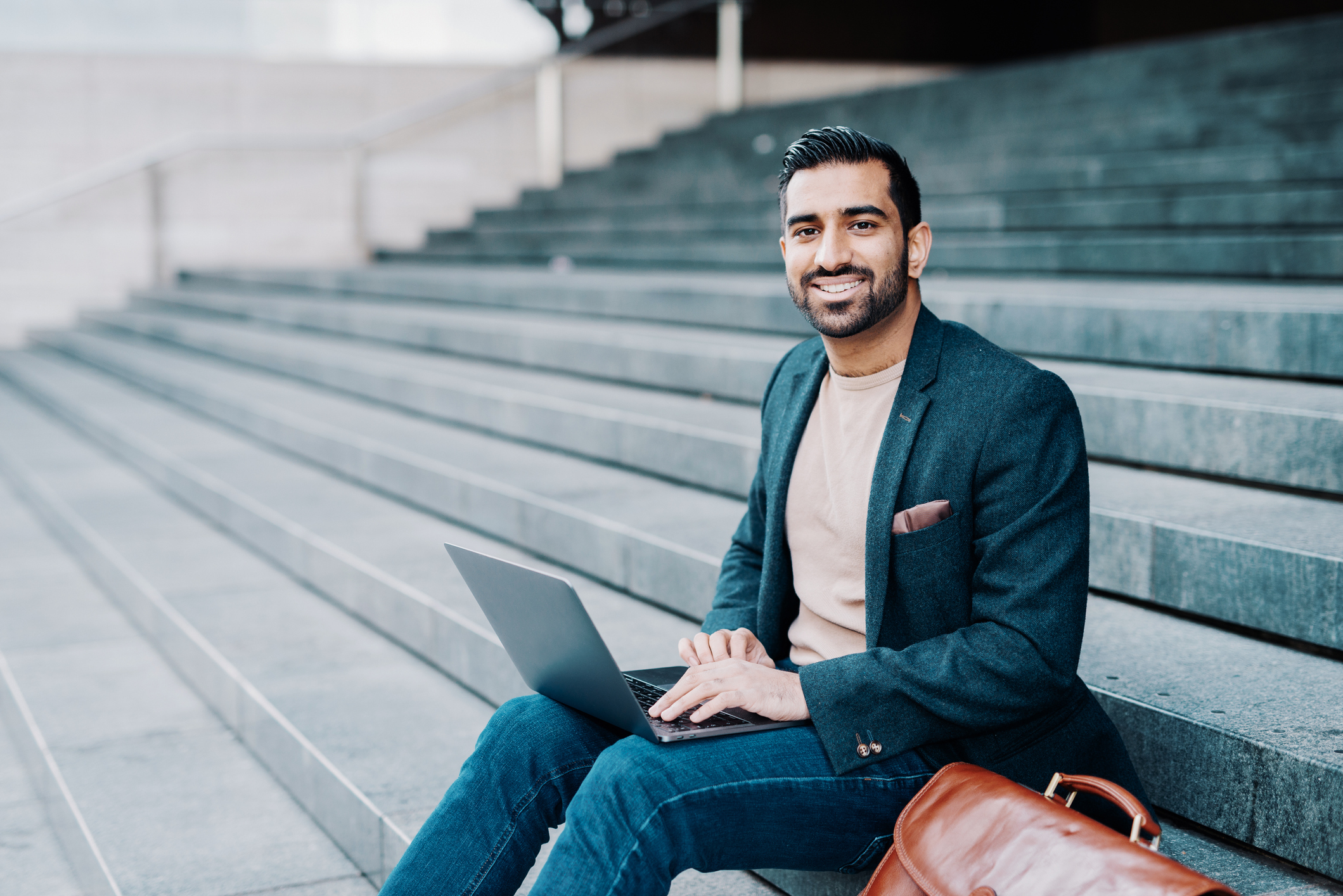 Investor outside and smiling.