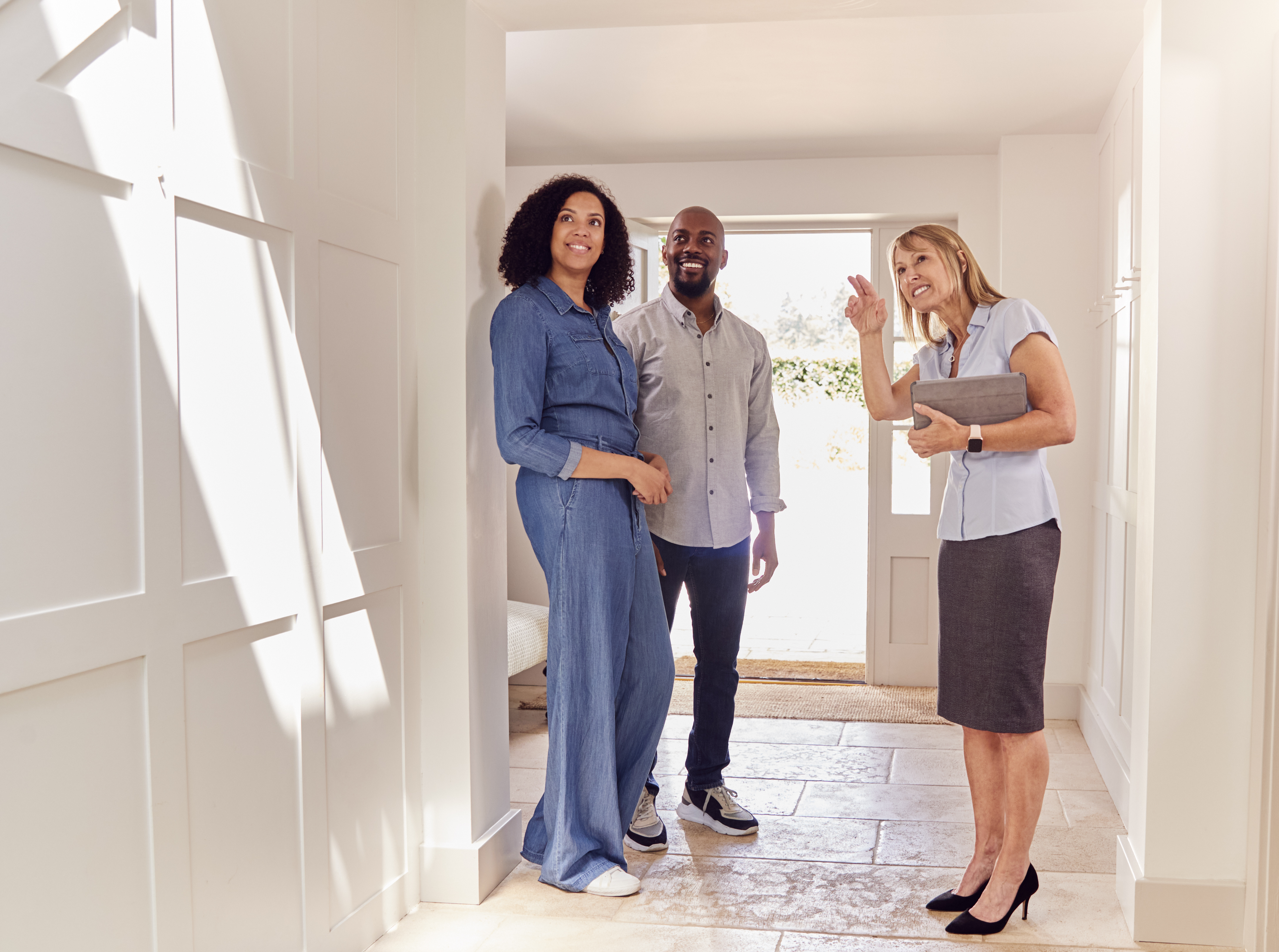 real estate agent showing home