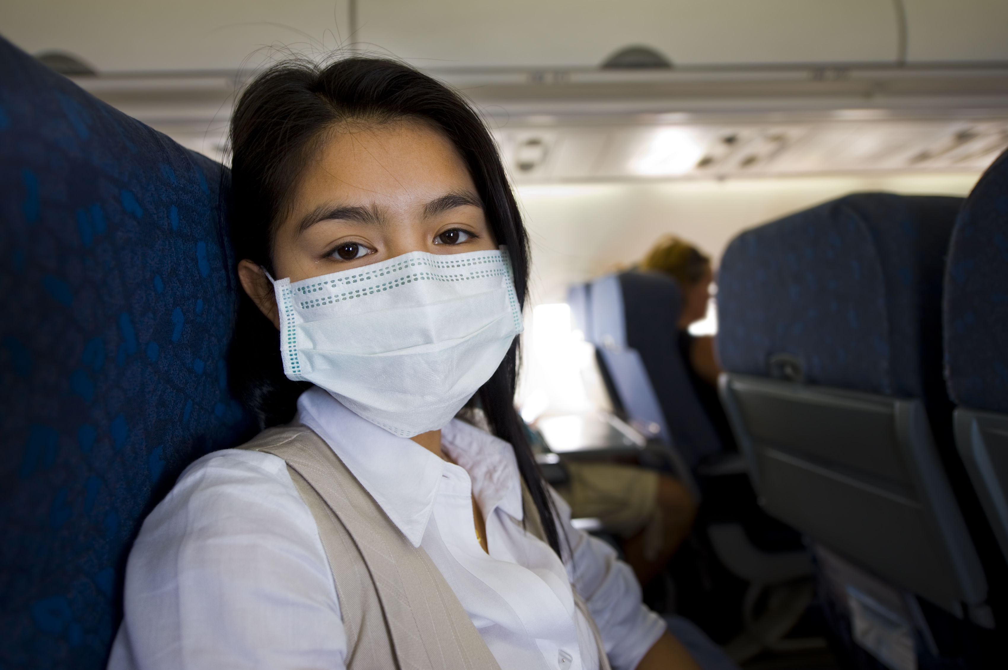 Traveler with a health mask on outbreak pandemic getty