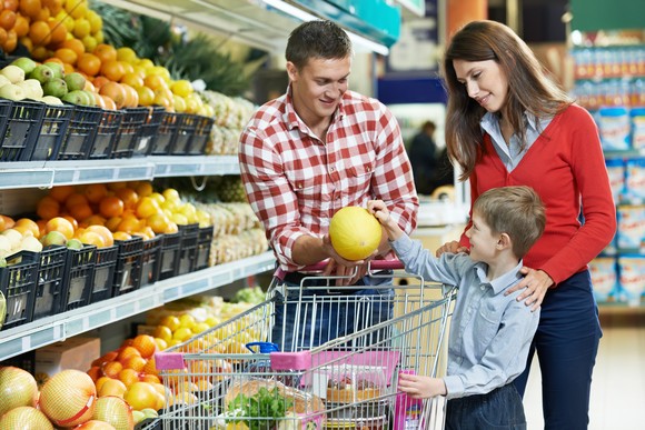 People grocery shopping.