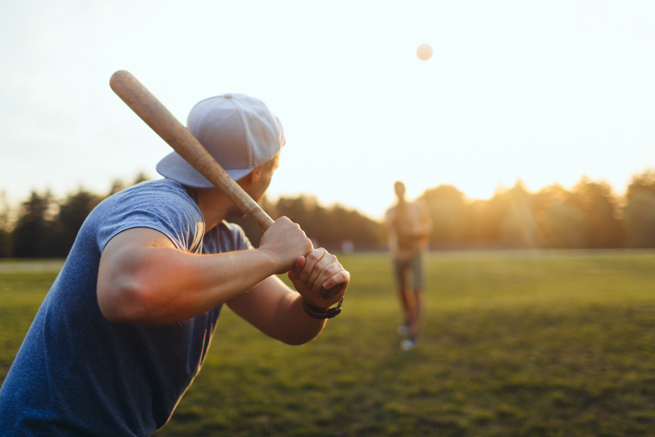 Baseball player concentrating on hitting the ball.