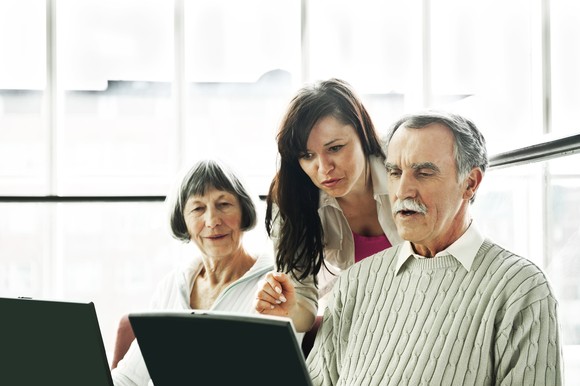 People looking at computers.