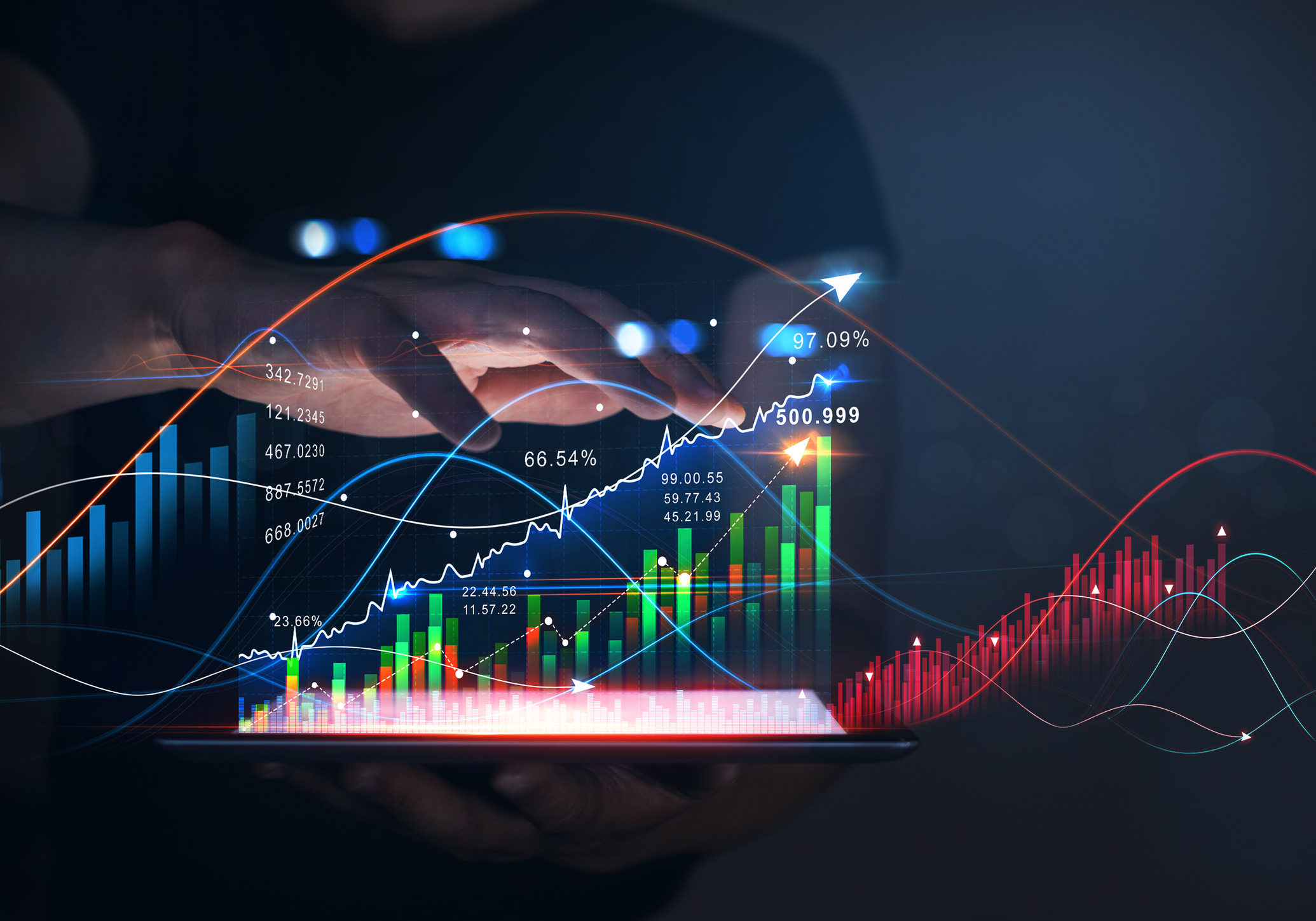 Hand hovering over a stock chart.
