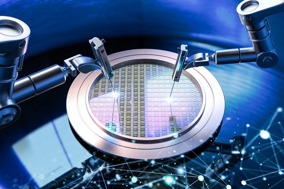 A robot completing the engineering process of a semiconductor chip.