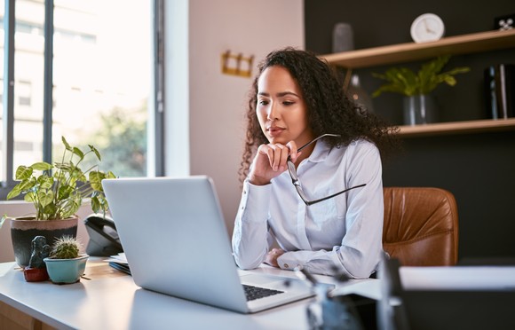 A person at a laptop.