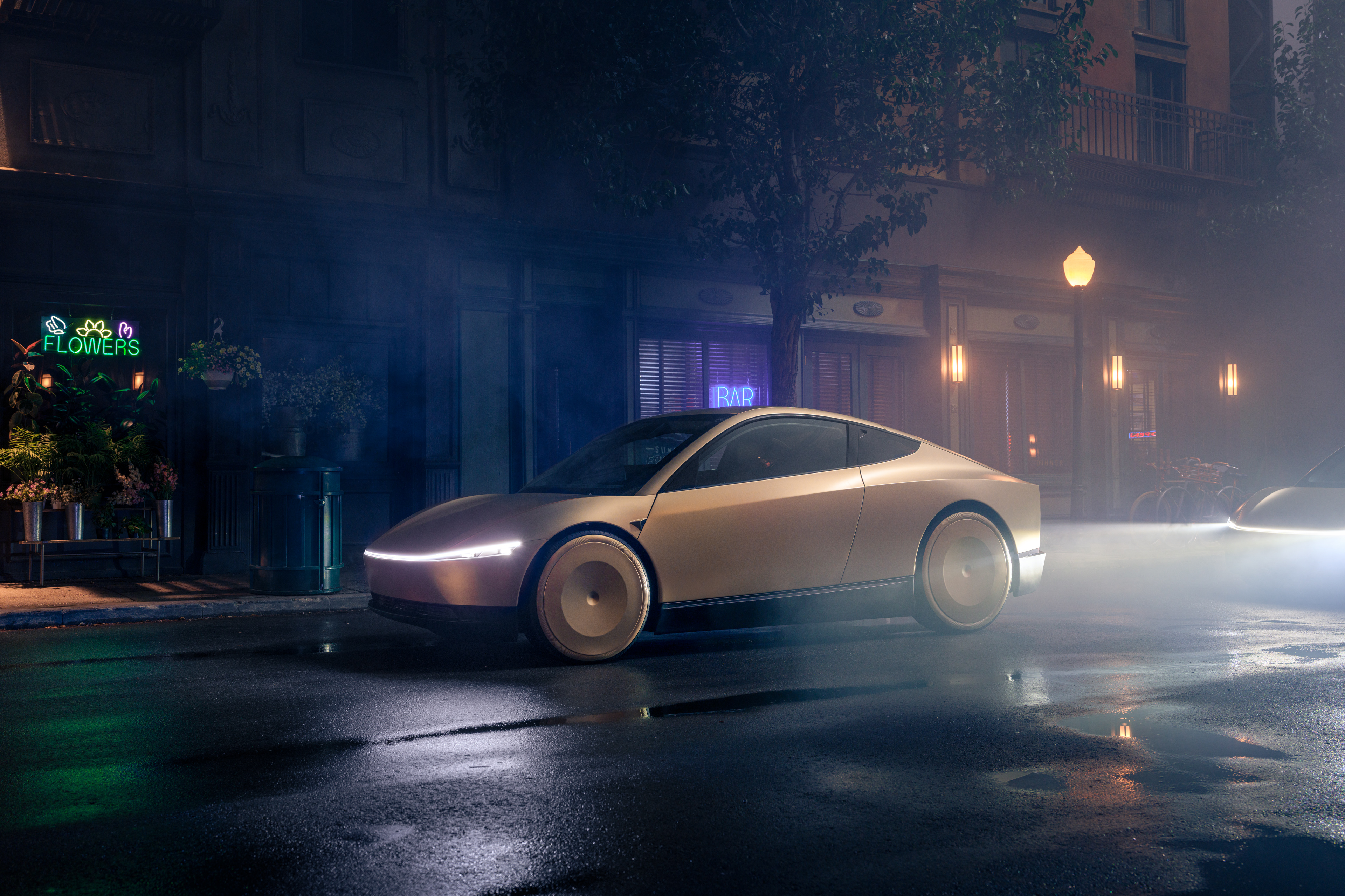 Tesla Robotaxi prototype on dark city street.