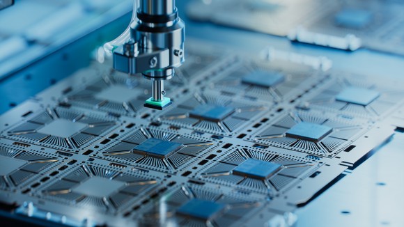 Semiconductor chips manufactured in a fab facility.
