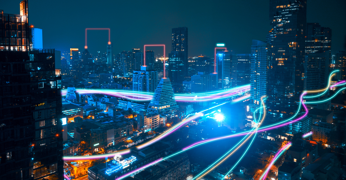 Rendering of beams of light coursing through a cityscape.