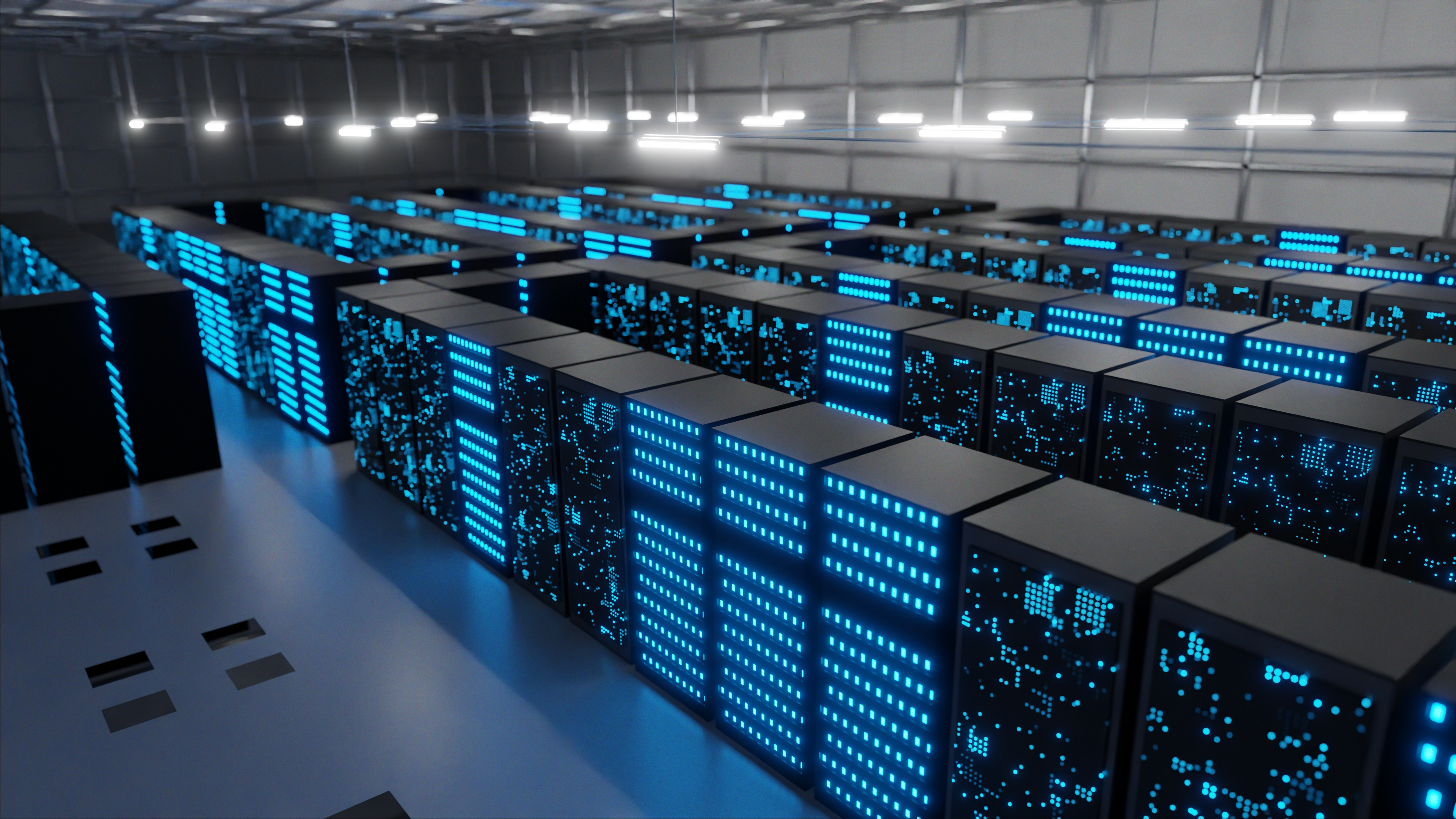Data center space full of computer racks with blue lights.