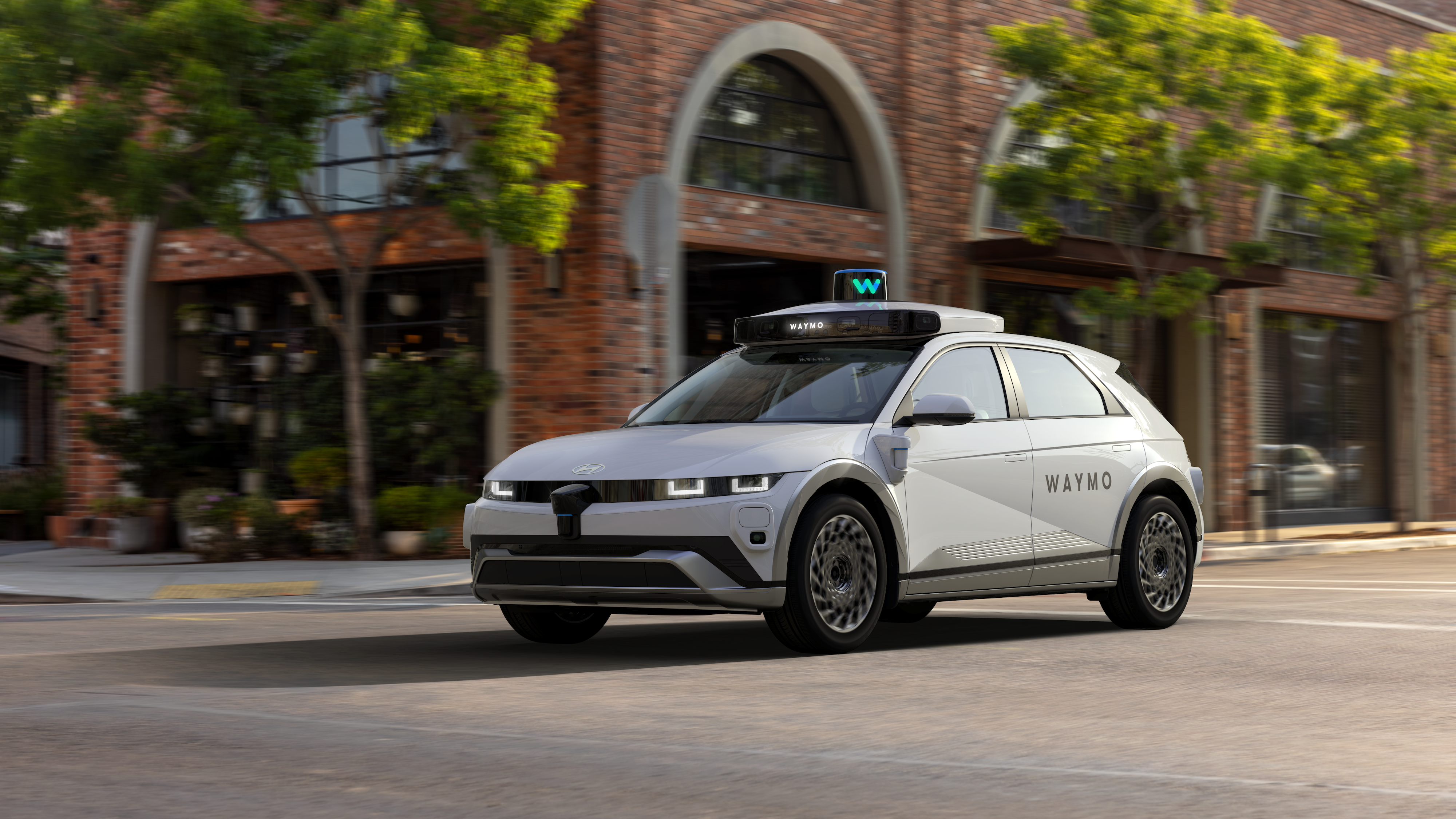 Rendering of Waymo vehicle on road.